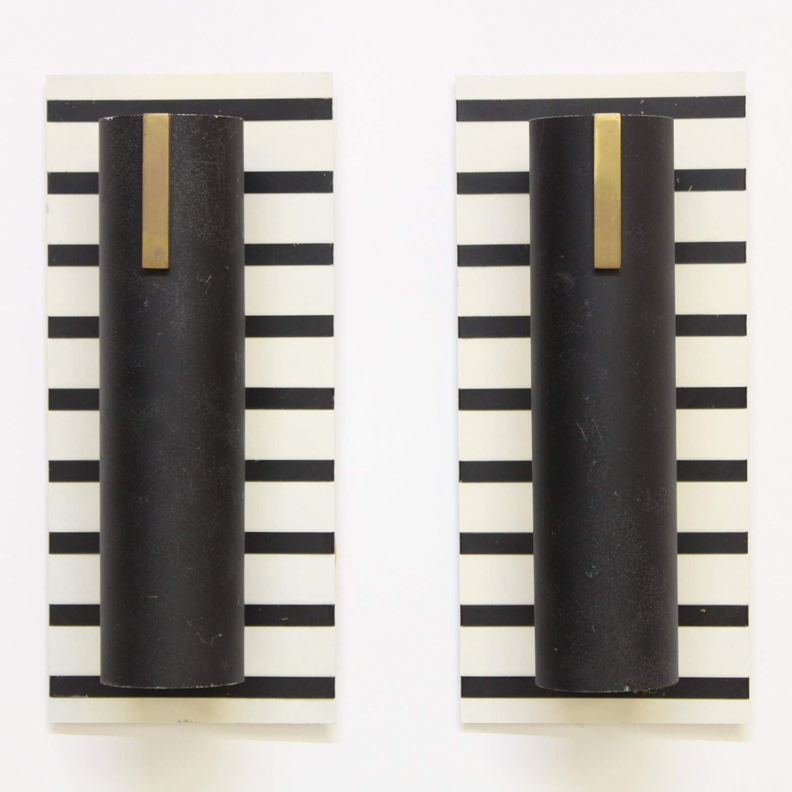 Pr McCarthy Black & White Enamel Sconces, c.1955: Pair McCarthy Black & White Enameled Wall Sconces, circa 1955 Dimensions: Property from the Estate of an Important New York Modernism Dealer. (NJWA62/2)(MS)