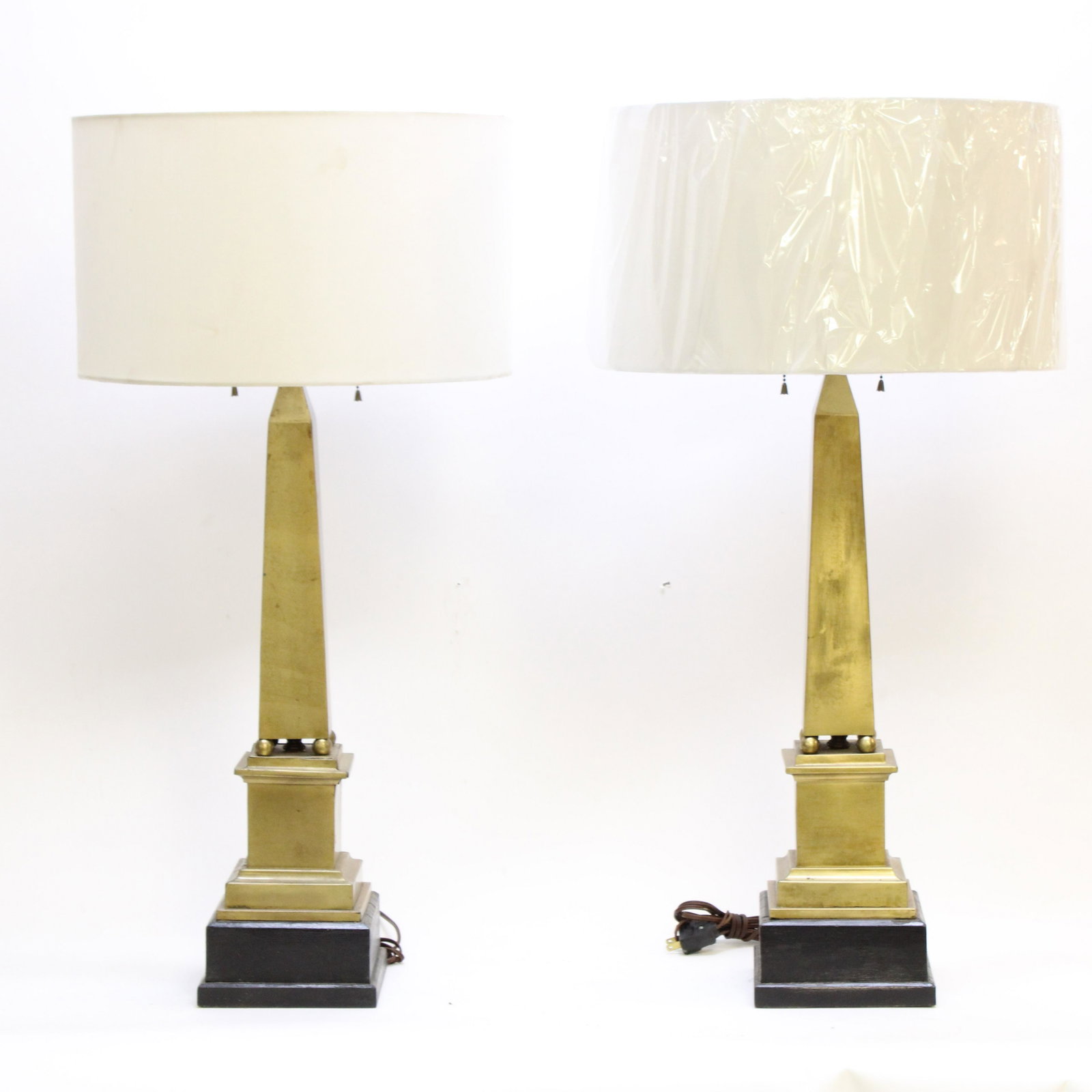 Pair of Marbro Oblisk Form Lamps: Pair of brass Marbro oblisk form table lamps. 3 fixtures each. Textured glass shade, black painted bases. Dimensions: 33.75 H with 7x7 base Property from a South Kent, CT collector. (JOHN6)(JUP)
