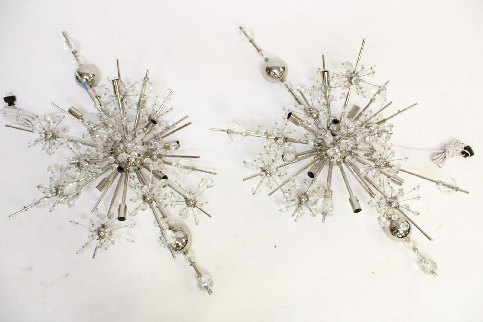Pair of 70s Sputnik Ceiling Fixtures: Pair of 1970s Chrome Faceted Glass Sputnik Ceiling Fixtures Dimensions: 22" diam Property from the Estate of an Important New York Modernism Dealer. (NJWA590)(MS)