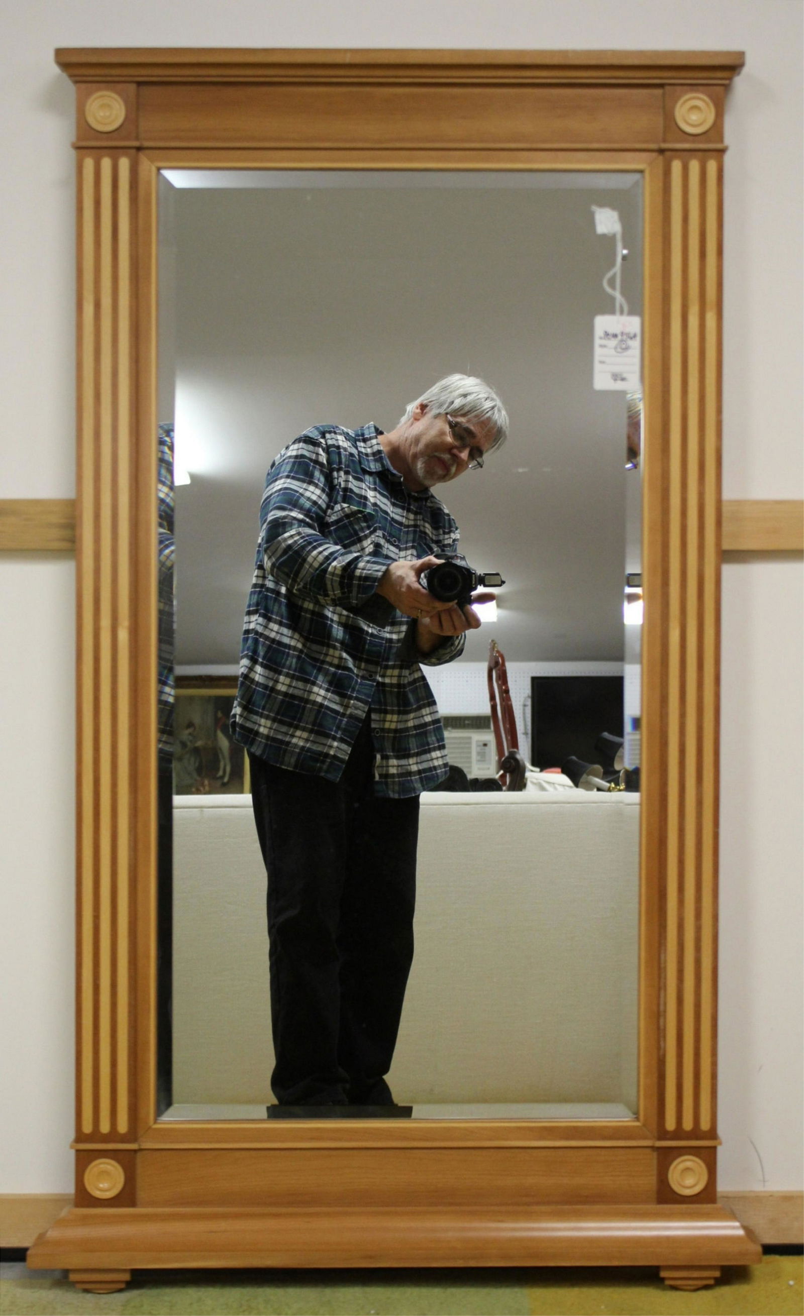 Neoclassical Mirror by Lord Snowdon (David Linley): Mirror with demilune sunburst top in natural wood, designed by Lord Snowdon the Younger (David Linley, b. 1961) Dimensions: 26.75 w by 48 h Property from a high-end Candlewood Lake contemporary home (