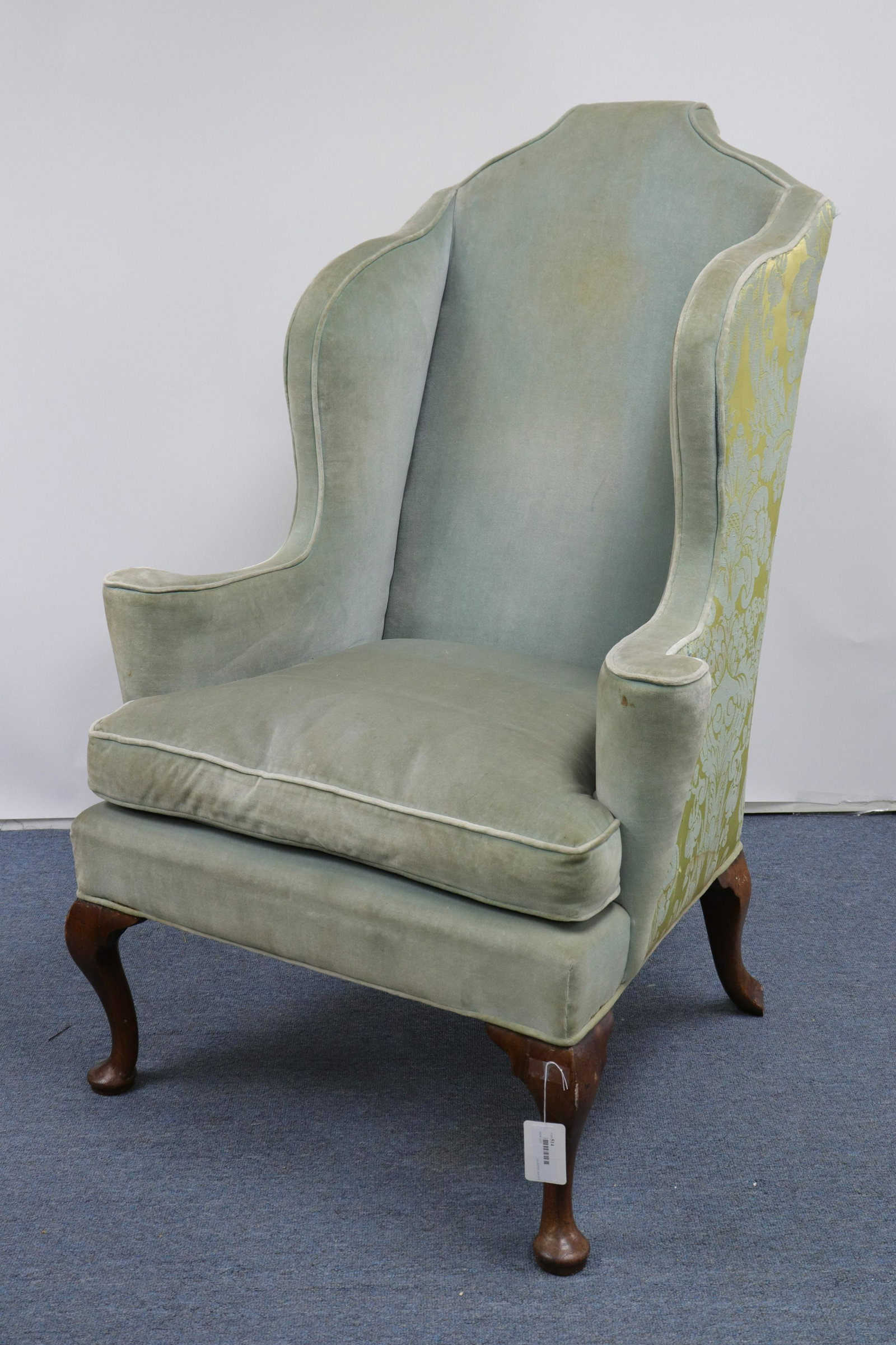 Queen Anne Walnut Wing Armchair, Early 18th C.: Queen Anne Walnut Wing Armchair, Early 18th C., upholstered in celadon velvet & foliate damask Dimensions: 48" H x 32" W x 33" D Property from the Greenwich Village townhouse of Dr John Downey's Estat