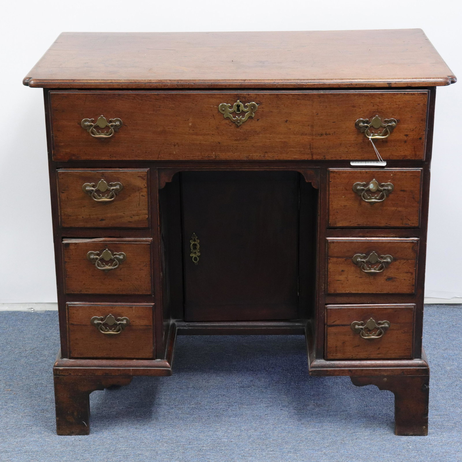 George III Mahogany Kneehole Desk, Late 18th C.: George III Mahogany Kneehole Desk, Late 18th C. Dimensions: 32" H x 34 1/2" W x 20 1/2" D Property from the Greenwich Village townhouse of Dr John Downey's Estate (NYDOW491)(MS)