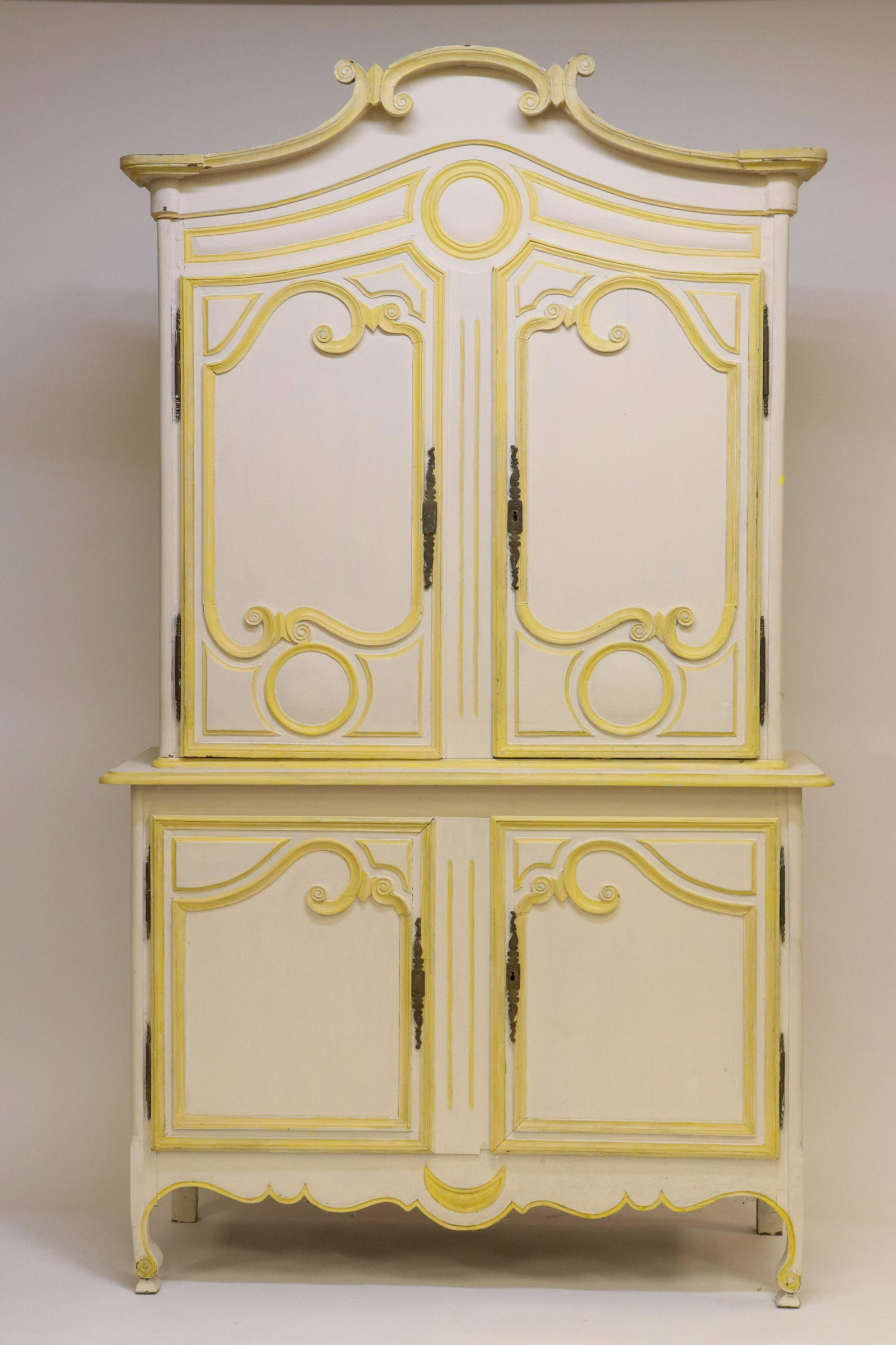 French Provincial Bureau a deux Corps, 18th C.: French Provincial Bureau a deux Corps, 18th C., yellow & cream paint of later date Dimensions: 94" H x 55" W x 20" D Property from the Litchfield Estate of Tracy H. Griswold (TGLI8030)(WT)