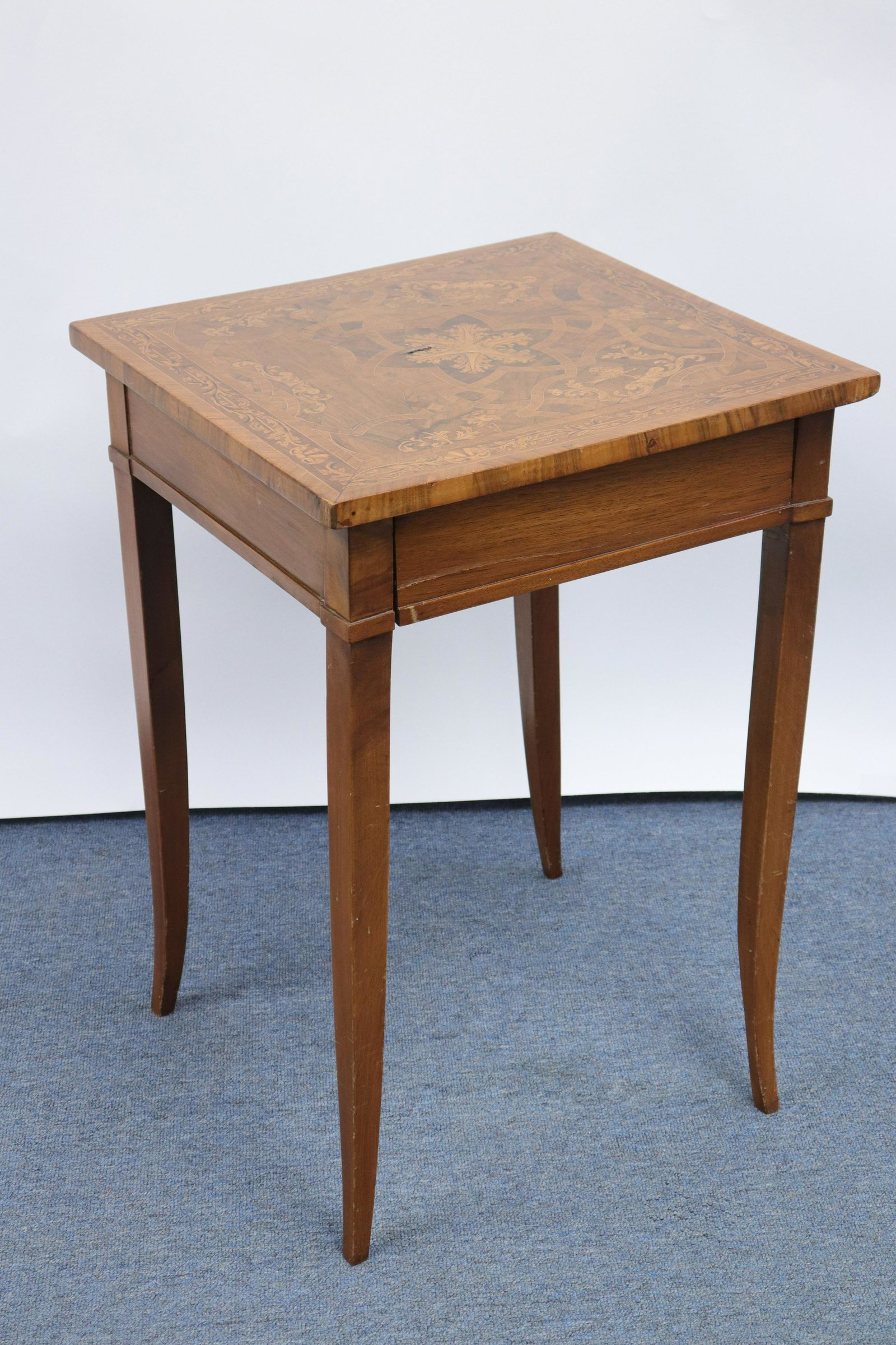 Italian Marquetry Inlaid Walnut Side Table: Italian Marquetry Inlaid Walnut Side Table, composed of older parts, top inlaid in the manner of Maggiolini Dimensions: 28" H x 19 1/2" W x 18 1/2" D Property from a Fairfield County home (MST488)(MS)