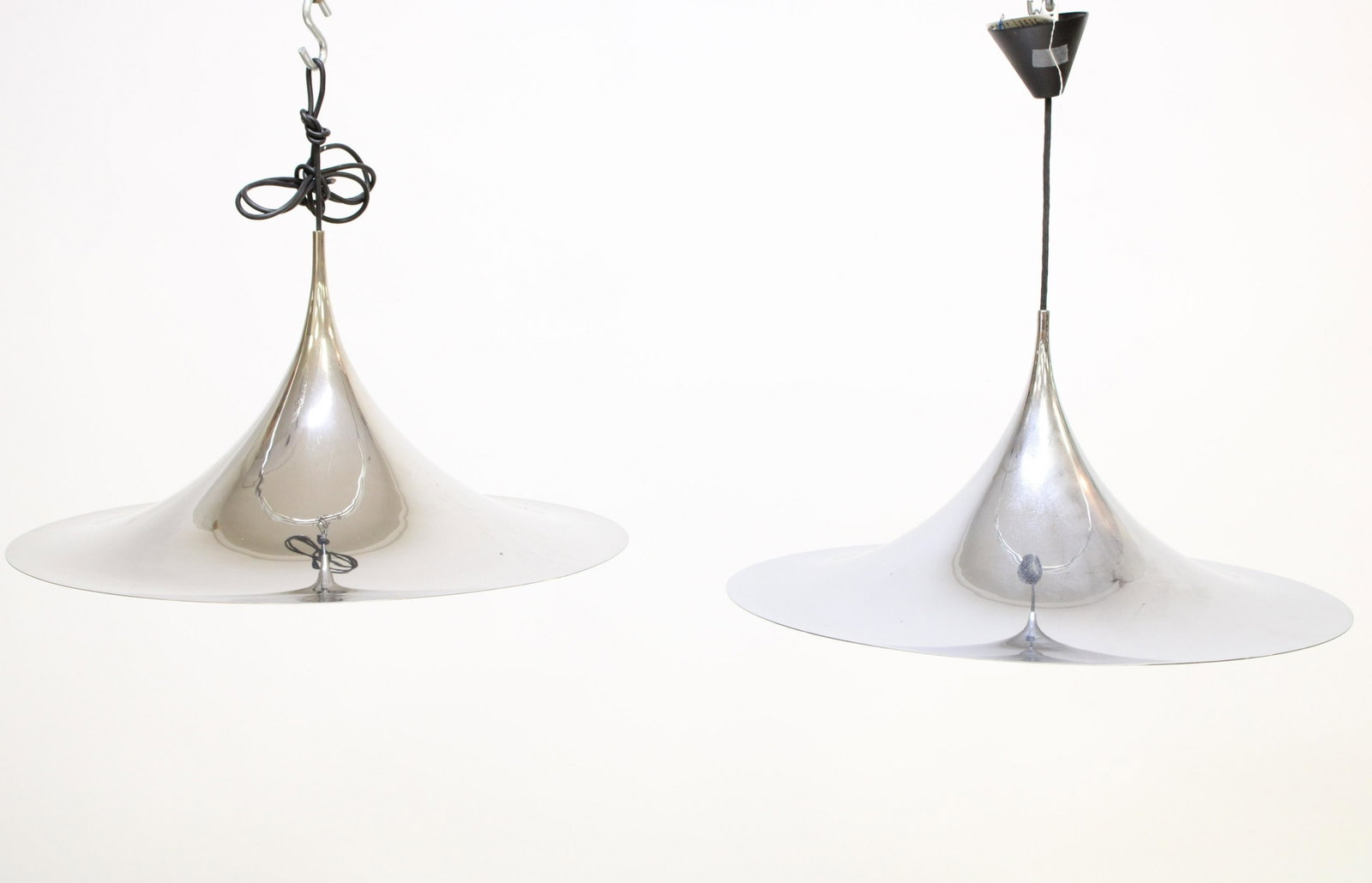 MCM Fog & Morup Pendant Light Fixture: Pair of AnsgarFog & E. Morup , Denmark , Metal Pendant Fixtures, conical form Dimensions: 12"H x 23"diameter Property from the collection of a Massachusetts professor. (STES9725/2)(MM)