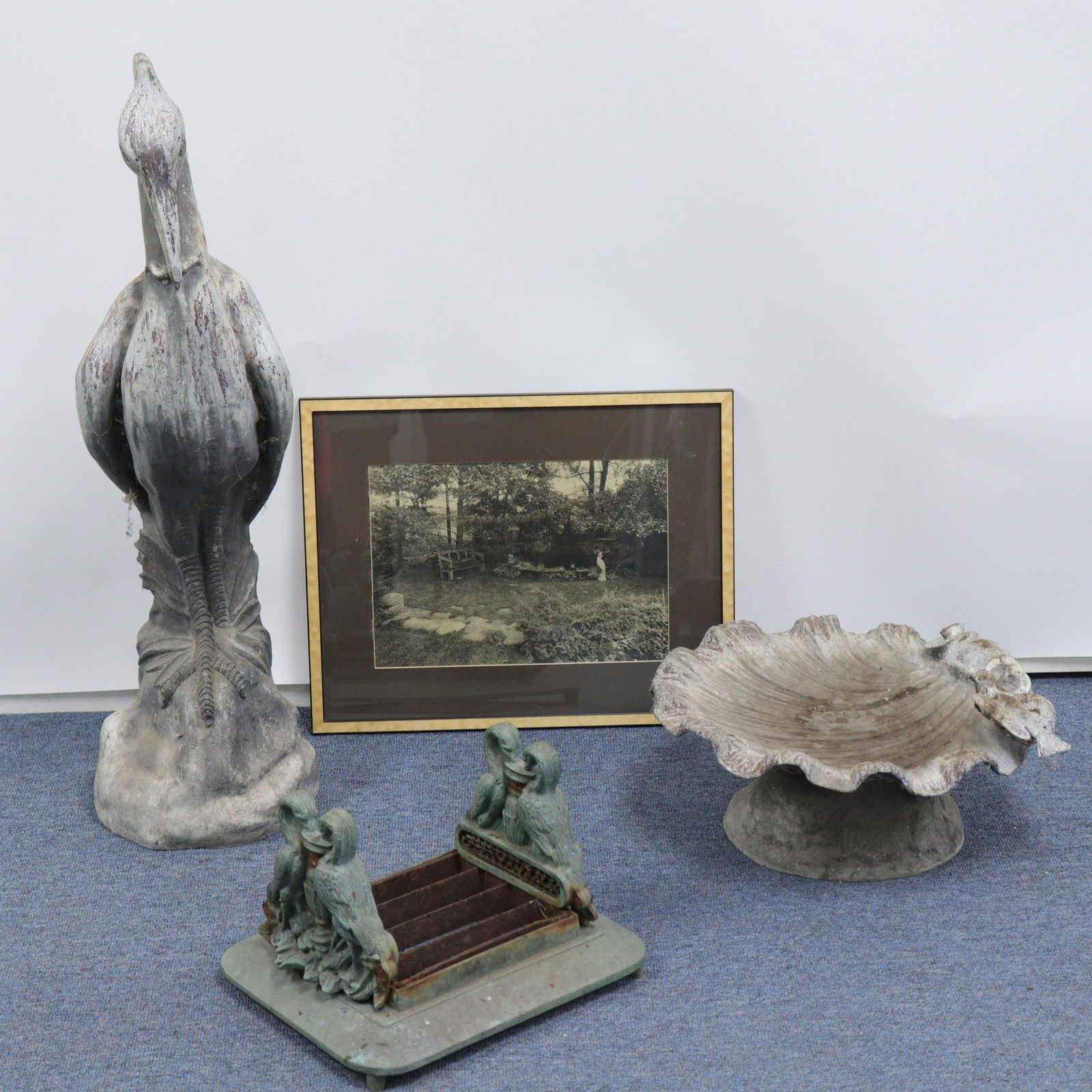 Garden Egret Statuary, Birdbath, Boot Scraper: Lead form statue and shell-form, perched bird birdbath; bird framed boot scraper.. Including photograph of statuary in an earlier garden setting. Birdbath signed Made In England under base. Dimensions