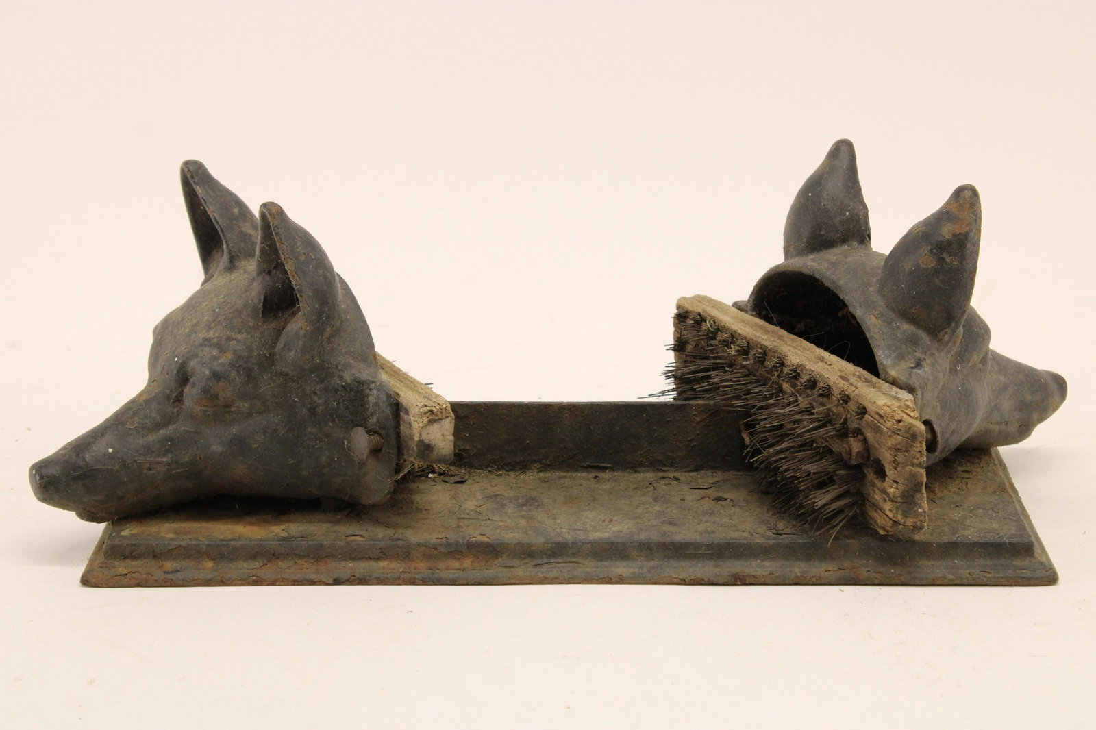 Cast Iron Fox Head Boot Brush: Cast Iron Fox Head Boot Brush, marked with a raised 'BB' Dimensions: 6" H x 18" L Property from the Litchfield Estate of Tracy H. Griswold (TGLI8543/2)(WT)