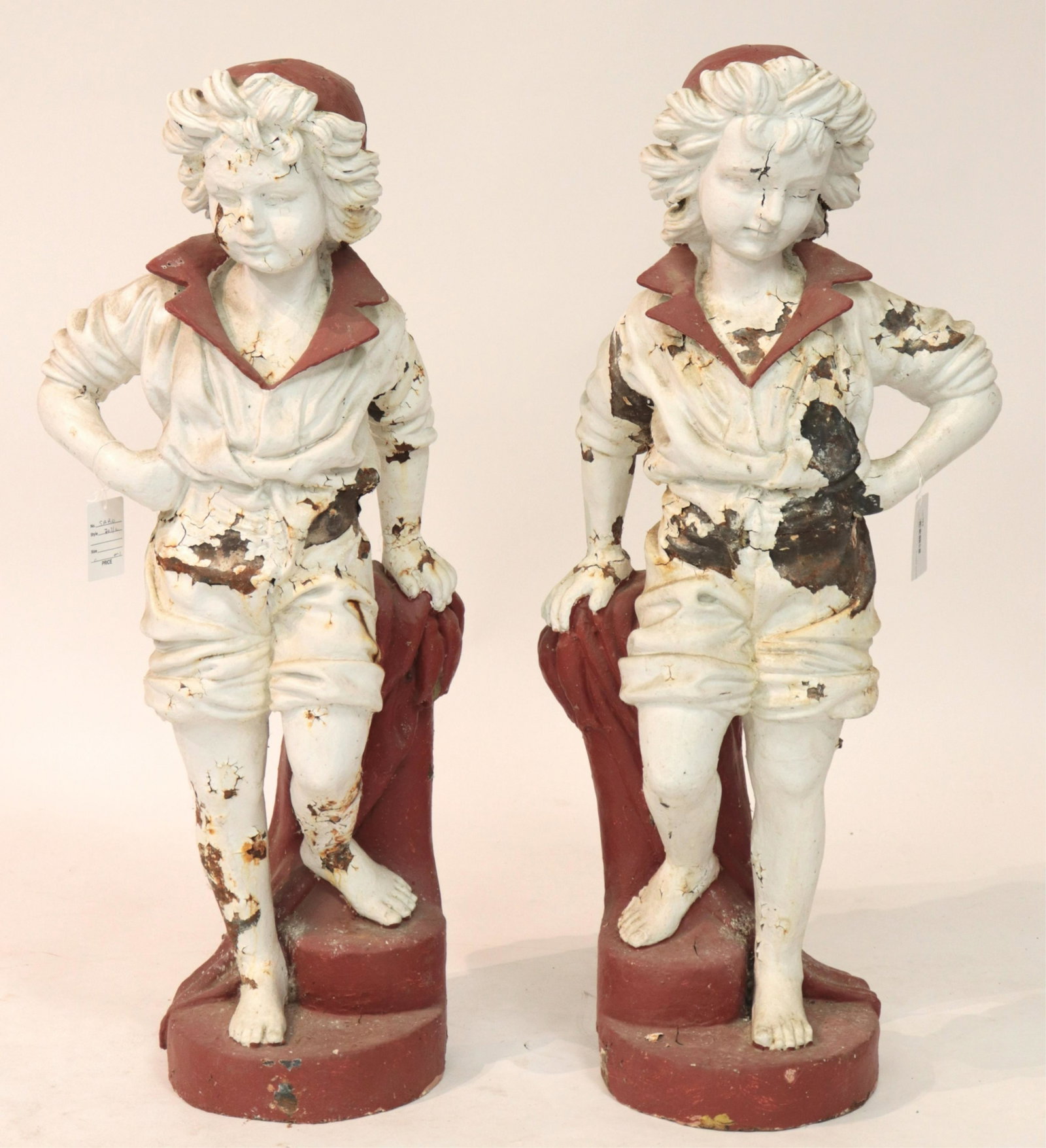 Pair of Cast Iron Figures of Boys: Dimensions: 38.5 H Property from the collection of Lester Saroff (SARO703/2)(MS)