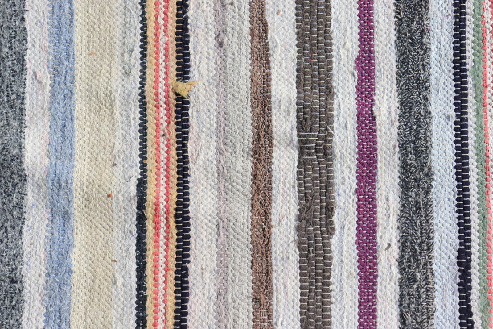 Vintage Swedish Rag Runner: Several distinct repeated black "bars" delineating multiple sections of colors. Dimensions: 9'3" x 2'3" Property from a Northwest CT collection (PDON9195)(JP)