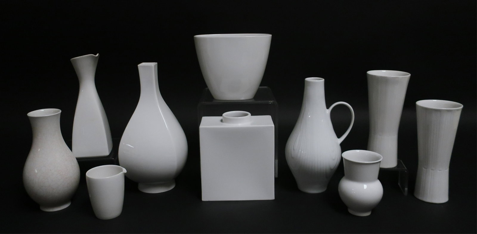 10 KPM Porcelain Vases, Jugs & Ewers: 10 KPM White Ground Porcelain Vases, Jugs & Ewers (10 pc.) NOTE: This lot is being re-offered due to nonpaying bidder Tim Housman of Palm Springs, CA. Dimensions: Largest 9" H Property from the Estate