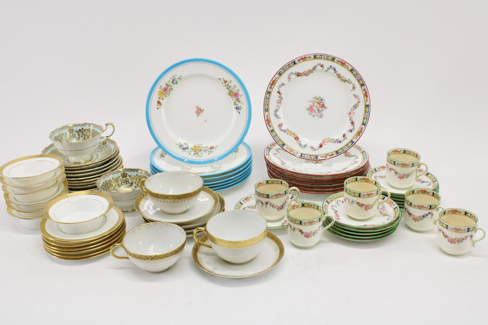 Mostly Minton Porcelains, Limoges, Paragon: Mostly Minton Porcelains includes 7 Robin's egg blue rimmed and floral decorated plates, 7 burgundy rimmed, 6 floral demi tasse cups and 12 saucers, 6 and 7 gold rimmed plates, 6 small bowls, Limoges 