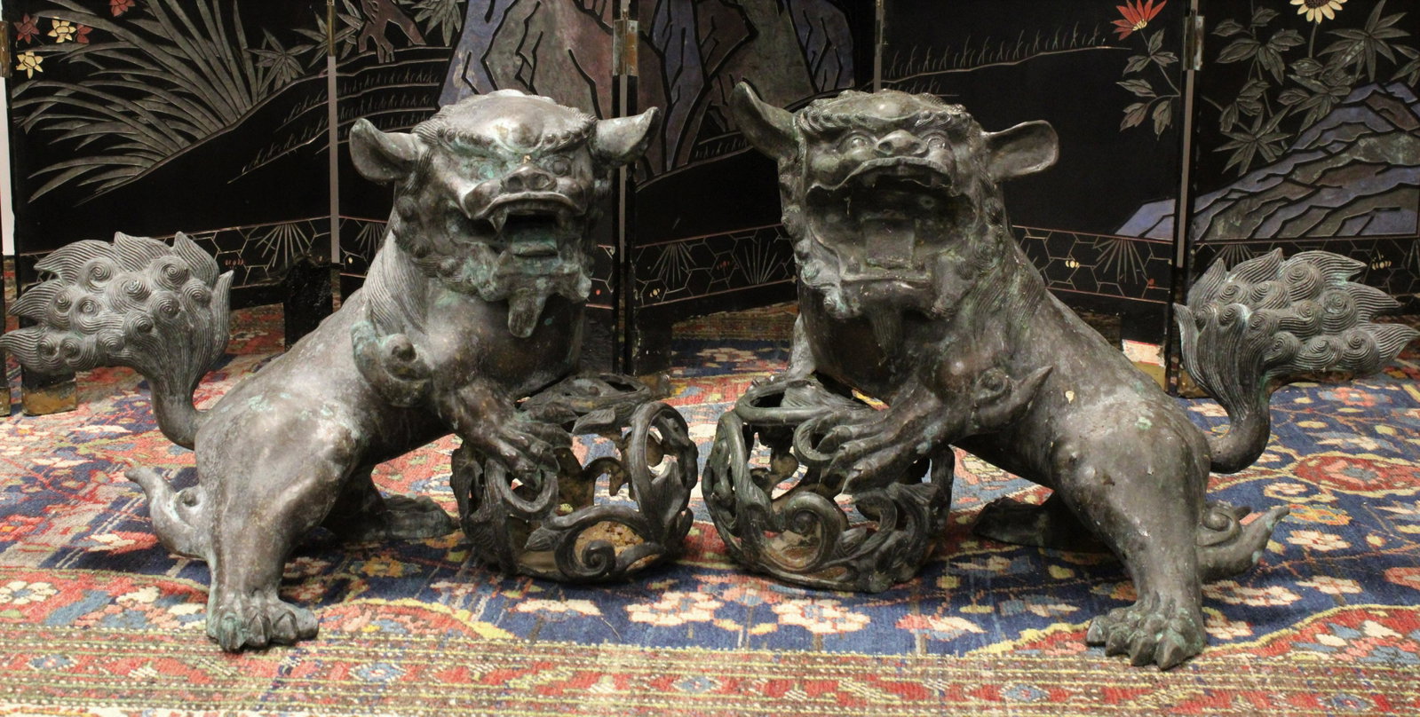 Pair of Large Bronze Foo Lions: Pair of Large Bronze Foo Lions. A pair of large cast Buddhist guardian lions. Moderately well cast with attractive patina. late 19th - 20th century Dimensions: 18" x 25" x 15" Property from a Litchfie