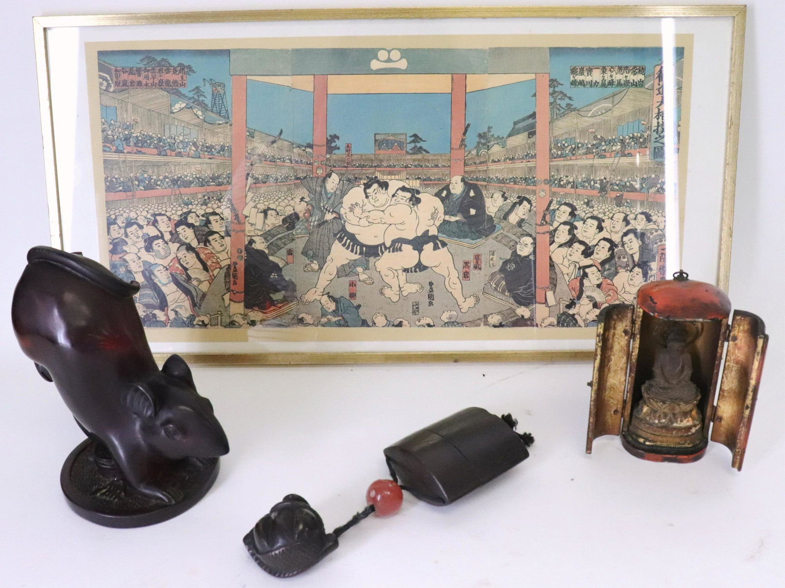 Chinese Carved Amber Rat and Japanese Items: Chinese Carved Amber Rat and Japanese Items. Lucky form of rat on gold ingots and coins. Offered along with small Japanese portable shrine box and simple inro with accompanying netsuke. Also included 