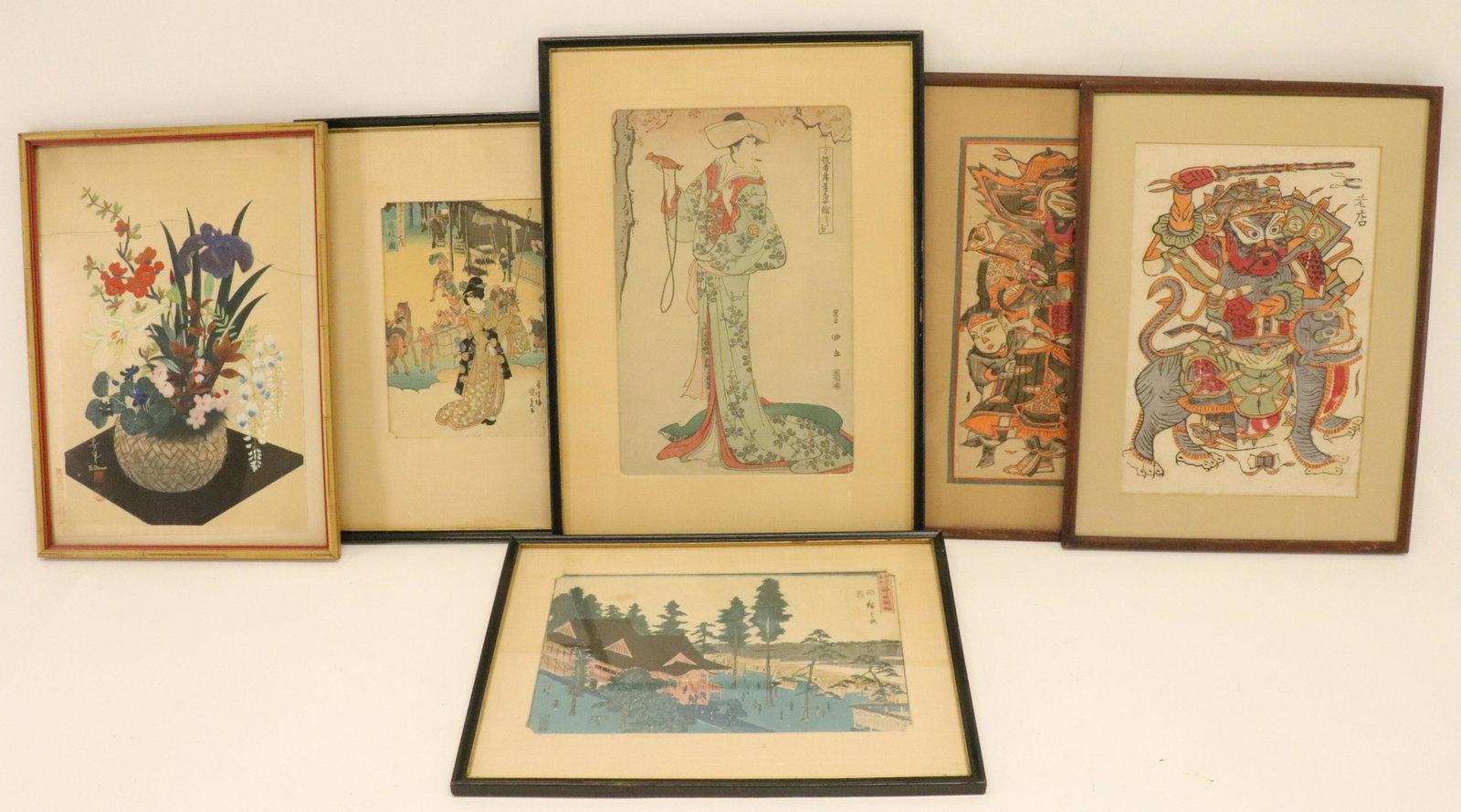 6 Asian Artworks: 6 Asian Artworks, comprising: 3 Japanese woodcuts, 2 Tibetan woodcuts and a watercolor signed B. Ohmo Dimensions: Largest frame 21" x 15" Property from the Litchfield Estate of Tracy Griswold (TGLI900