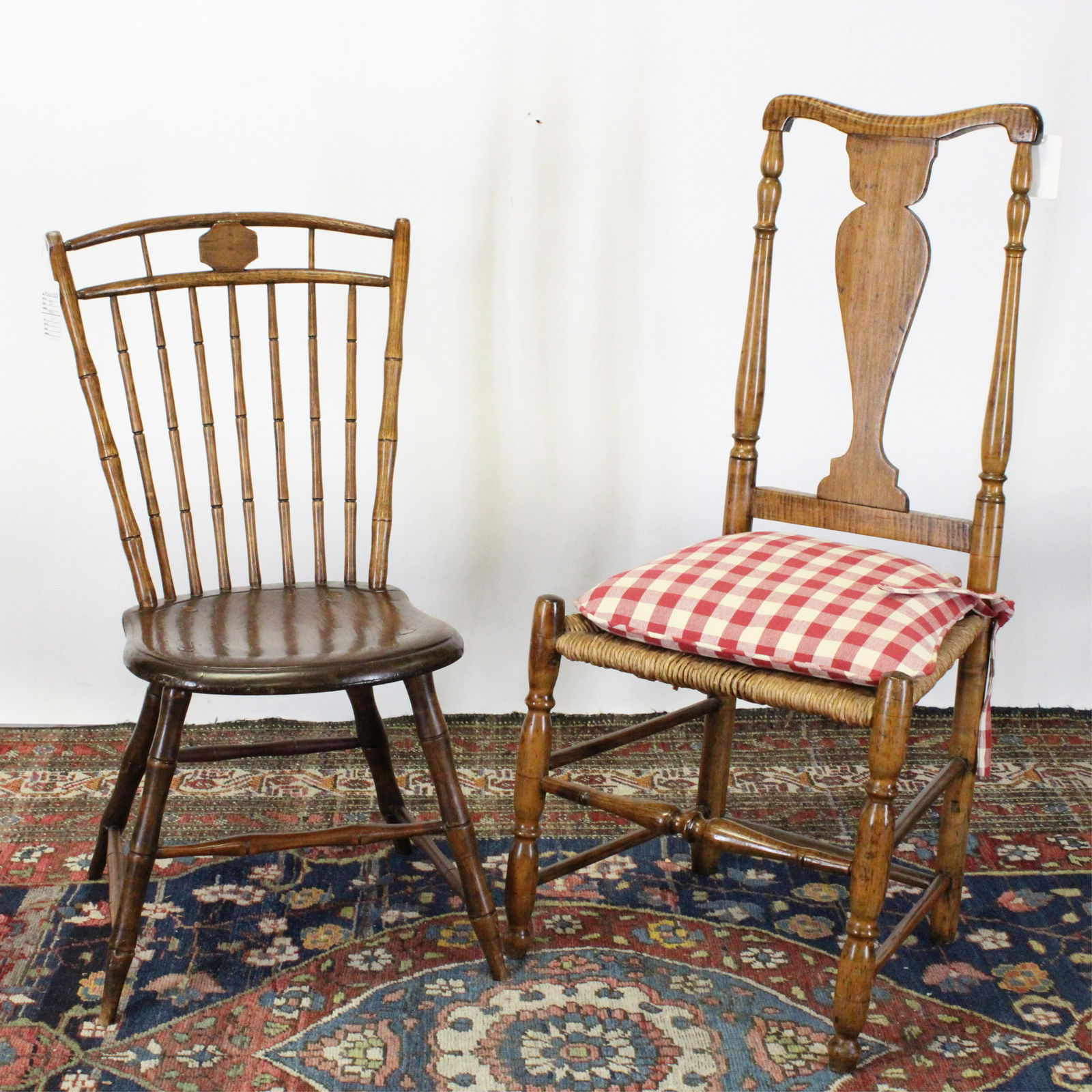 American Queen Anne Chair, c. 1730: American Queen Anne side chair, mixed woods, with vase splat beneath a concave yoke shaped top rail, flanked by turned uprights, rush seat, c. 1730 along with a Bamboo form Windsor Chair Dimensions: 4