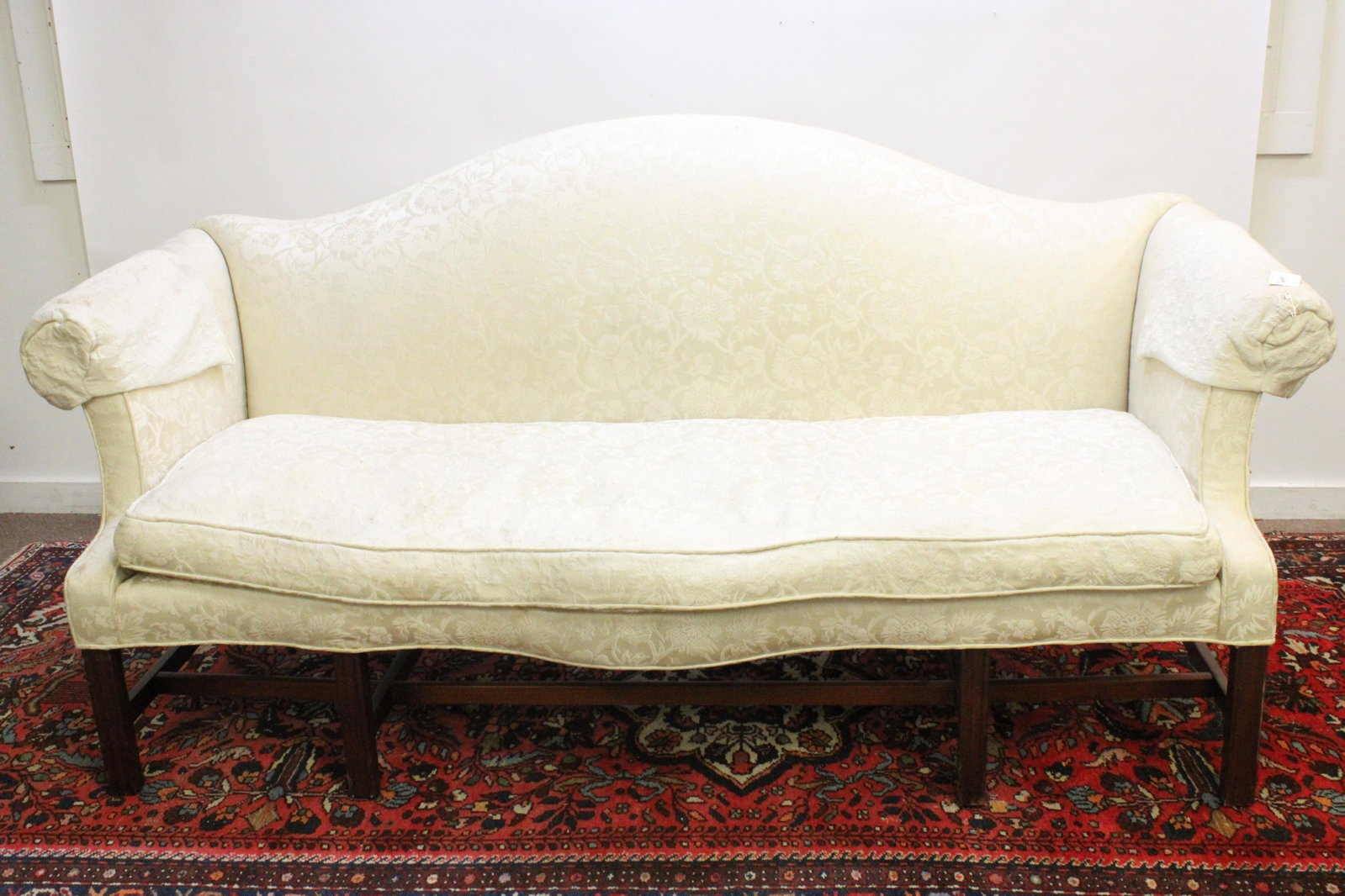 Chippendale Mahogany Camelback Sofa, 18th C.: Chippendale Mahogany Camelback Sofa, 18th C. Dimensions: 39" H x 80" L Property from a Westchester County, NY estate (RICH9241)(WT)