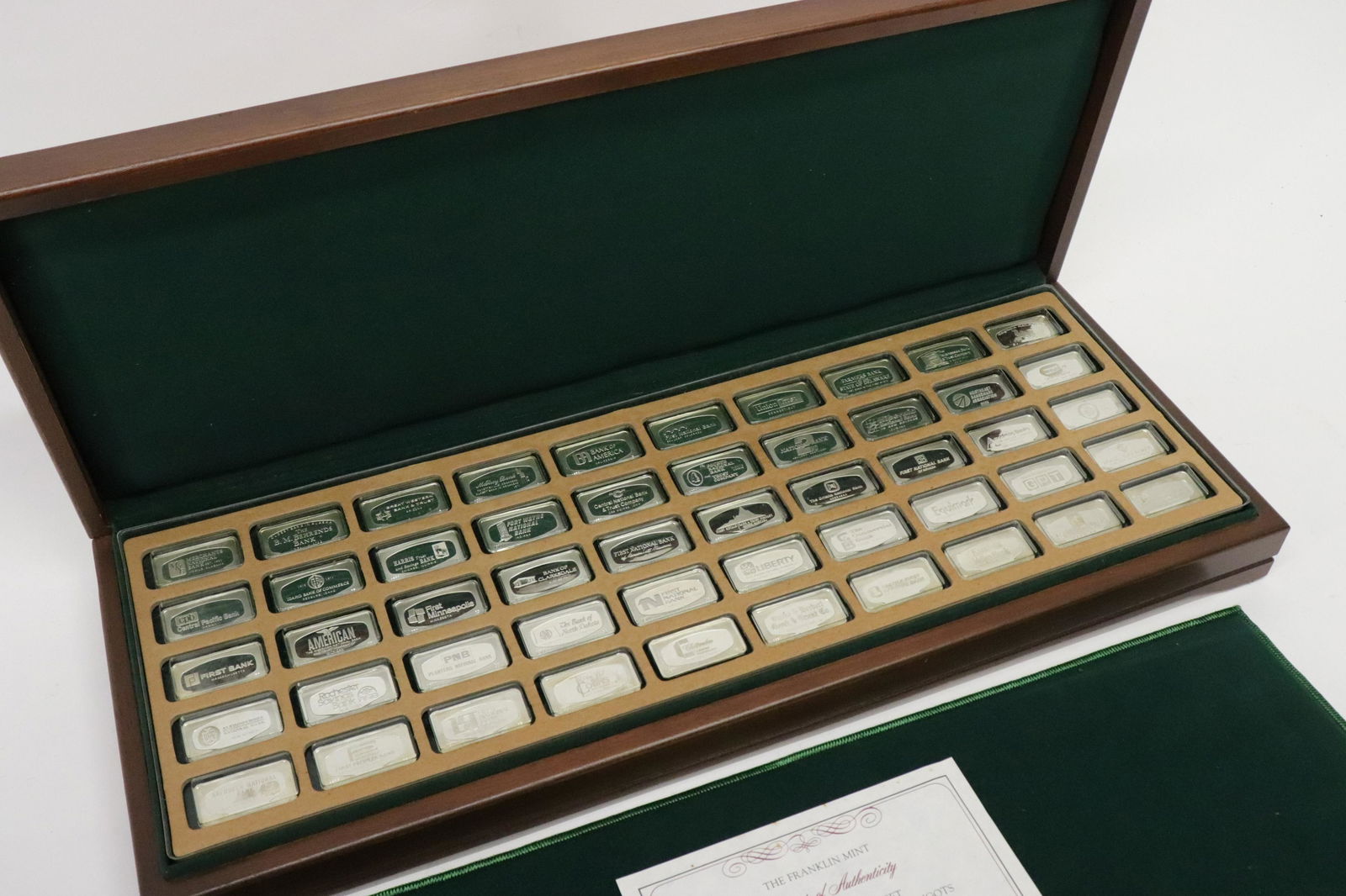 Franklin Mint Regular Ed. Sterling Silver Ingots: The Franklin Mint Regular Edition Set Bankmarked Sterling Silver Ingots from 1971, consisting of 50 1000 grain sterling silver ingots (1000 grains = 2.08333 ozt) Dimensions: 1" x 1 3/4", Custom box 3"