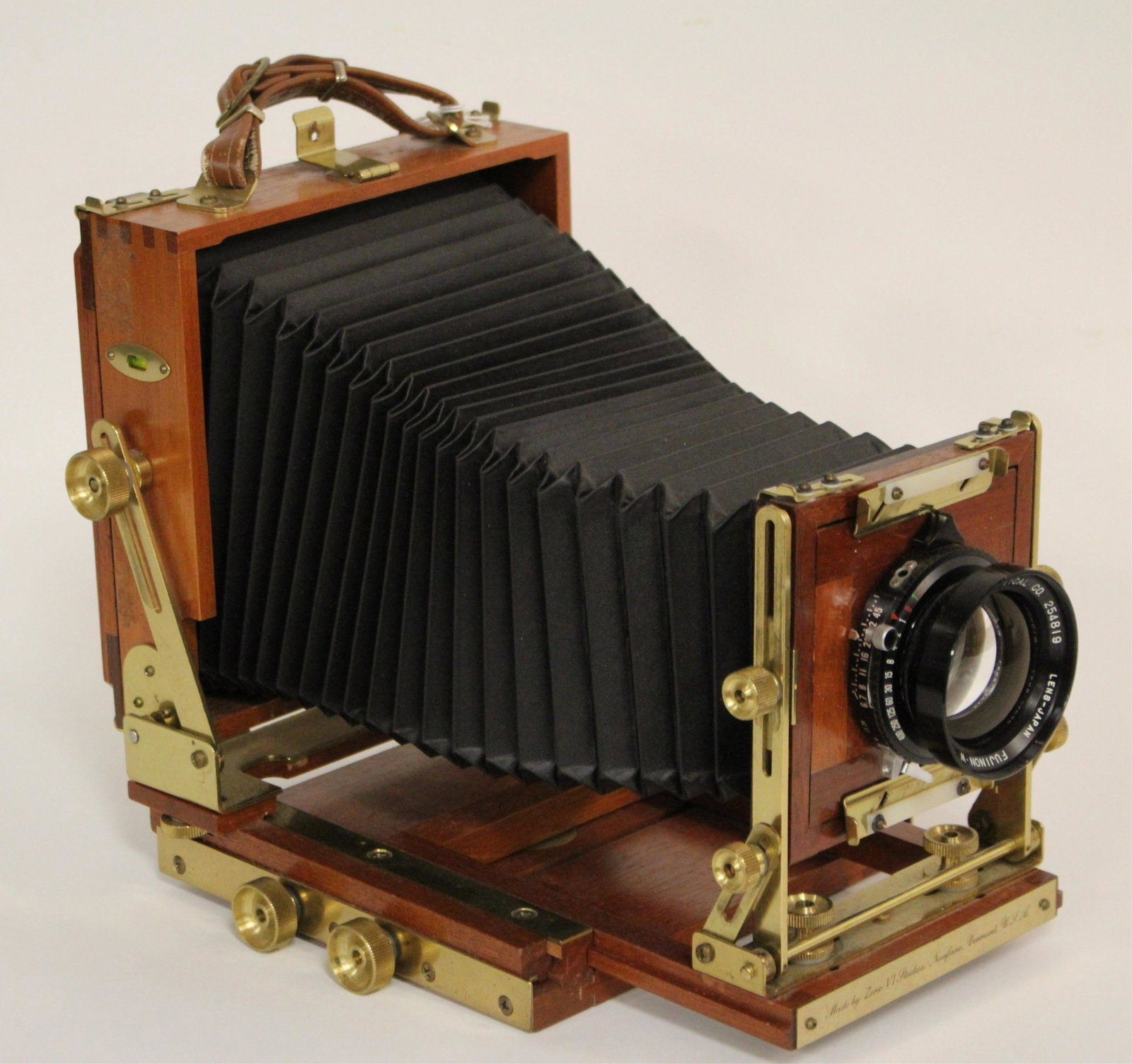Zone VI Walnut Field Camera 4x5: Walnut Zone VI 4x5 field camera, with lens, along with a box of 24 film holdersNOTE: this lot is being reoffered due to non-paying bidder Samuel Hollin Photography of Amesbury, MA. Dimensions: Aprox. 