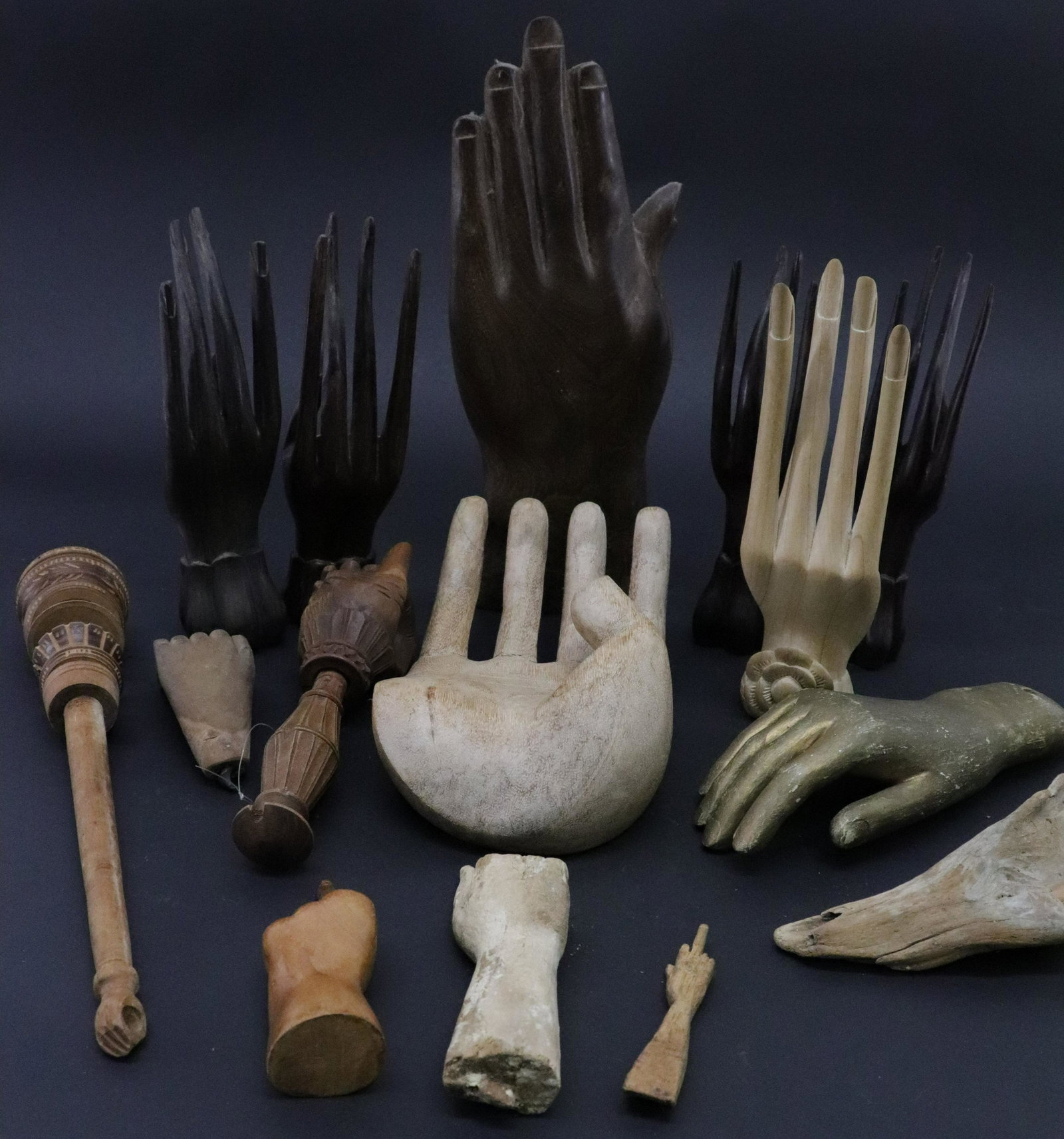 15 Wood Hands: 15 Wood Hands, includes a rattle and a nutmeg grinder Dimensions: Shortest 3 1/2" x Longest 11 1/2" Property from the Litchfield Estate of Tracy Griswold (TGLI9182/15)(WT)