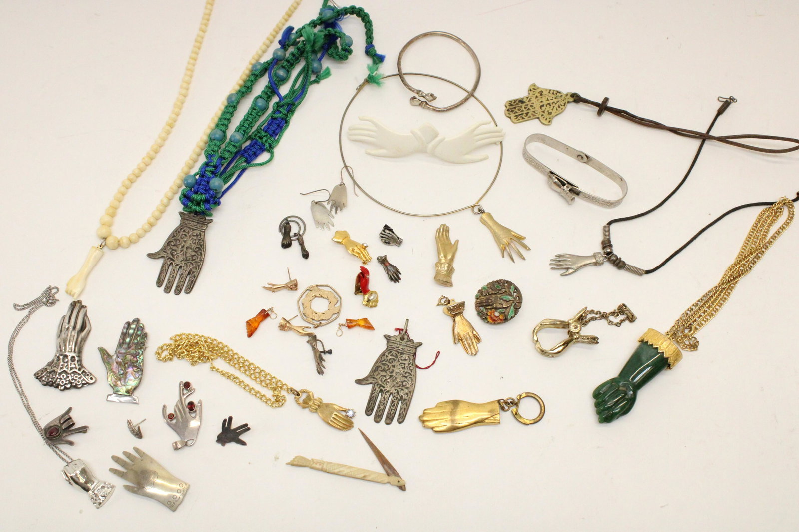Hand Theme Costume & Sterling Jewelry: Group of Hand Theme Costume Jewelry, includes a few sterling silver brooches Dimensions: Sizes - various. Property from the Litchfield Estate of Tracy Griswold (TGLI9192/lot)(WT)