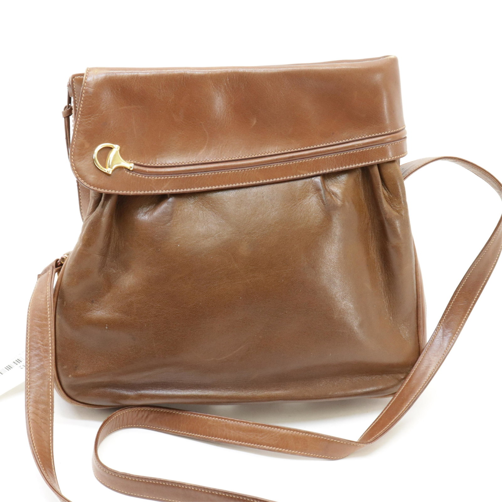 Gucci - Vintage Crossbody: Gucci - Vintage Crossbody. Dark brown calf skin leather exterior, horse bit details. Dimensions: