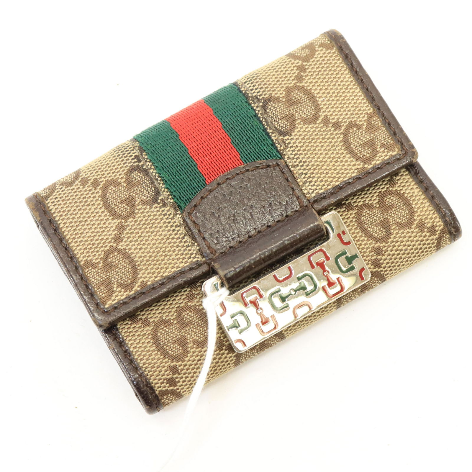 Gucci - Web Line Key Holder 6: Gucci - Web Line Key Holder 6. Serial number 146211/0959 Dimensions: 9 x 5 cm
