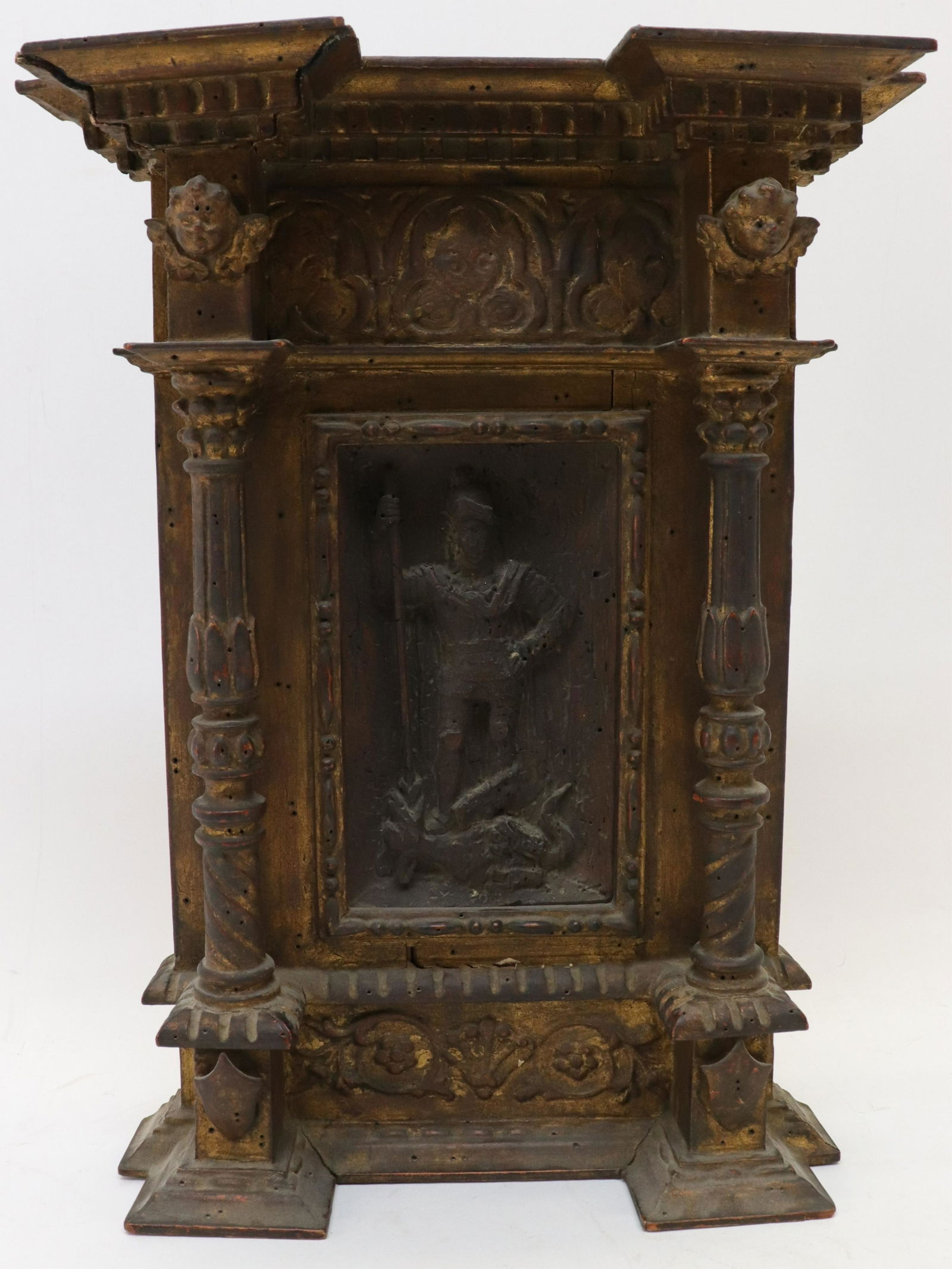 Continental Relief Panel, Saint George & Dragon: Continental Wood Relief Panel of Saint George and the Dragon, contained in a later Renaissance style carved giltwood frame (RIJO2325)(WT) Dimensions: 15" H x 11 1/4" Property From the Estate of Richar