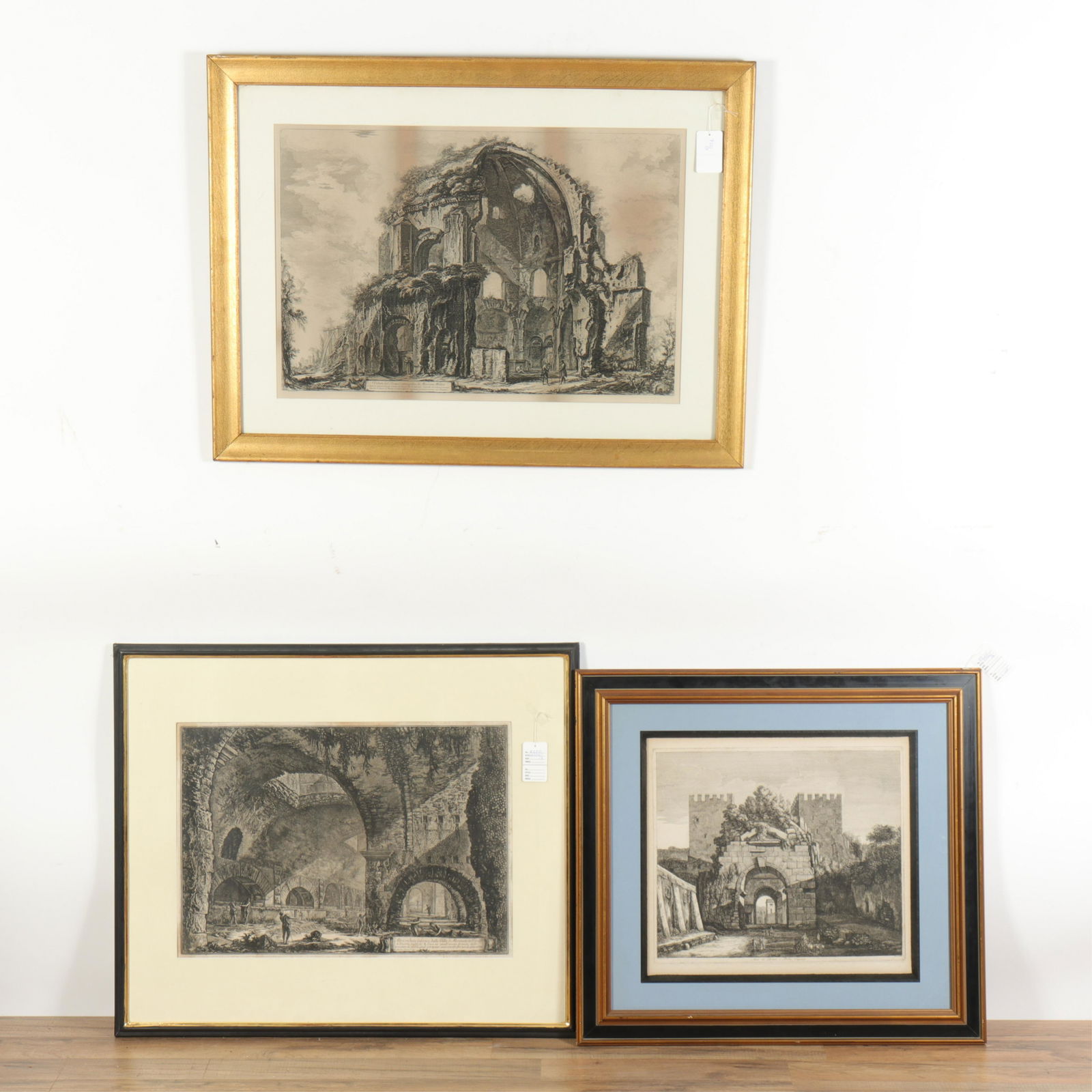 3 Architectural Capriccio Engravings; Piranesi: 3 Architectural Capriccio Engravings, by Cavalier Piranesi, C. Rovine & Luigi Rossini (RIJO2756/3)(WT) Dimensions: Image 14 1/2" x 17 1/2", 19" x 28 1/4", 16" x 24"; Largest frame 28" x 37 1/2" Proper