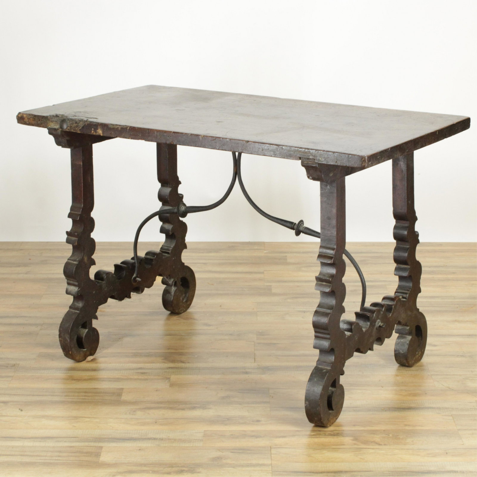 Italian Baroque Library Table: Italian Baroque Library Table, walnut, wrought iron stretcher, scroll feet (RIJO2677)(WT) Dimensions: 31 1/2" H x 47 1/2" W x 27" D Property From the Estate of Richard I Johnson (1925-2020), Chestnut 