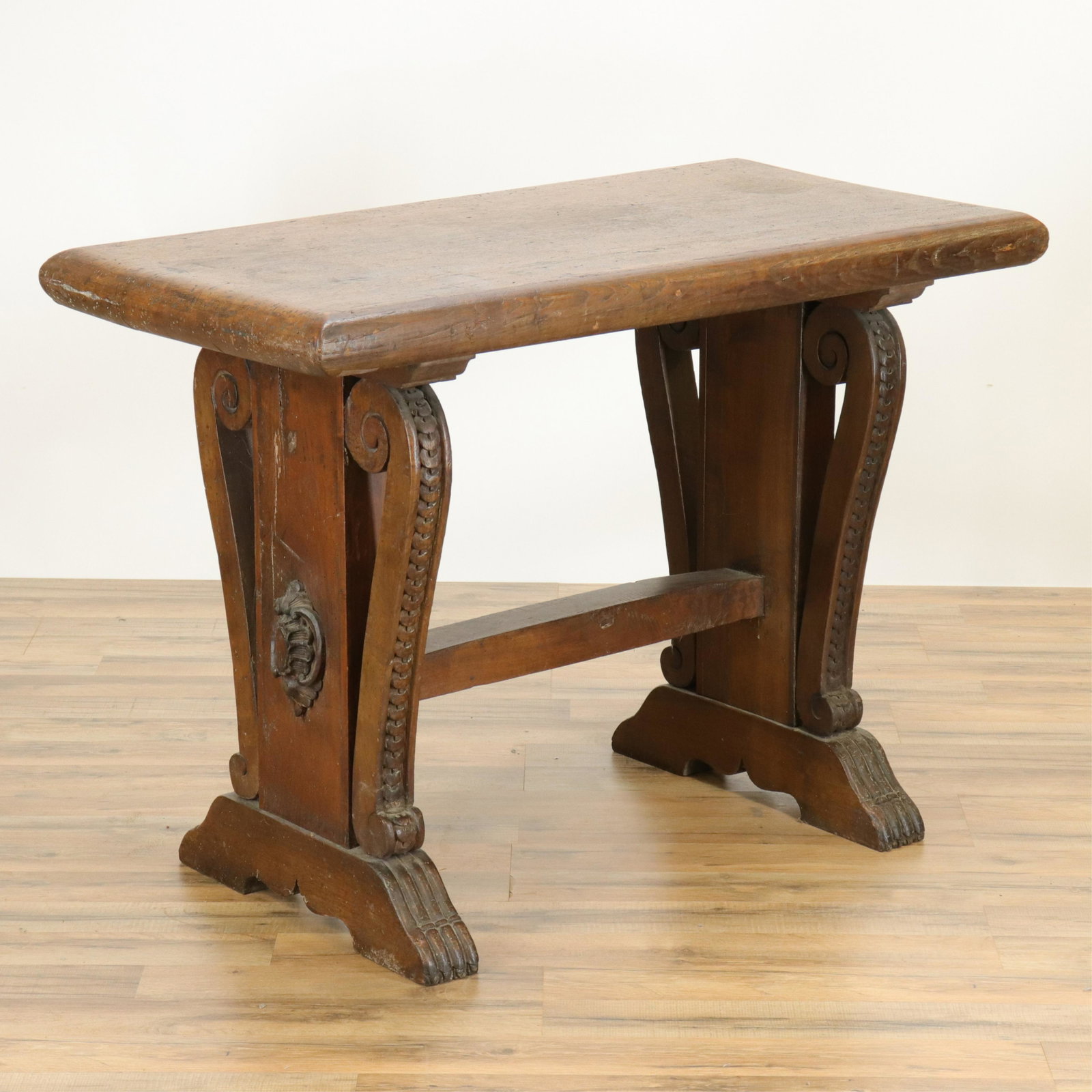 Italian Baroque Style Walnut Trestle Table: Italian Baroque Style Walnut Trestle Table, thick top (RIJO2673)(WT) Dimensions: 29 1/2" H x 41 1/2" W x 21" D Property From the Estate of Richard I Johnson (1925-2020), Chestnut Hill, Massachusetts. 
