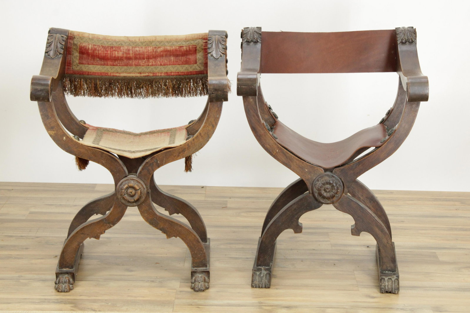 2 Italian Baroque Style Curule Youth Chairs: 2 Italian Baroque Style Curule Youth Chairs, walnut with leaf carvings, leather and velvet back/seat (RIJO2667/2)(WT) Dimensions: 29 1/2" H x 22 3/4" W x 17" D and 29" H x 22" W x 16" D Property From 