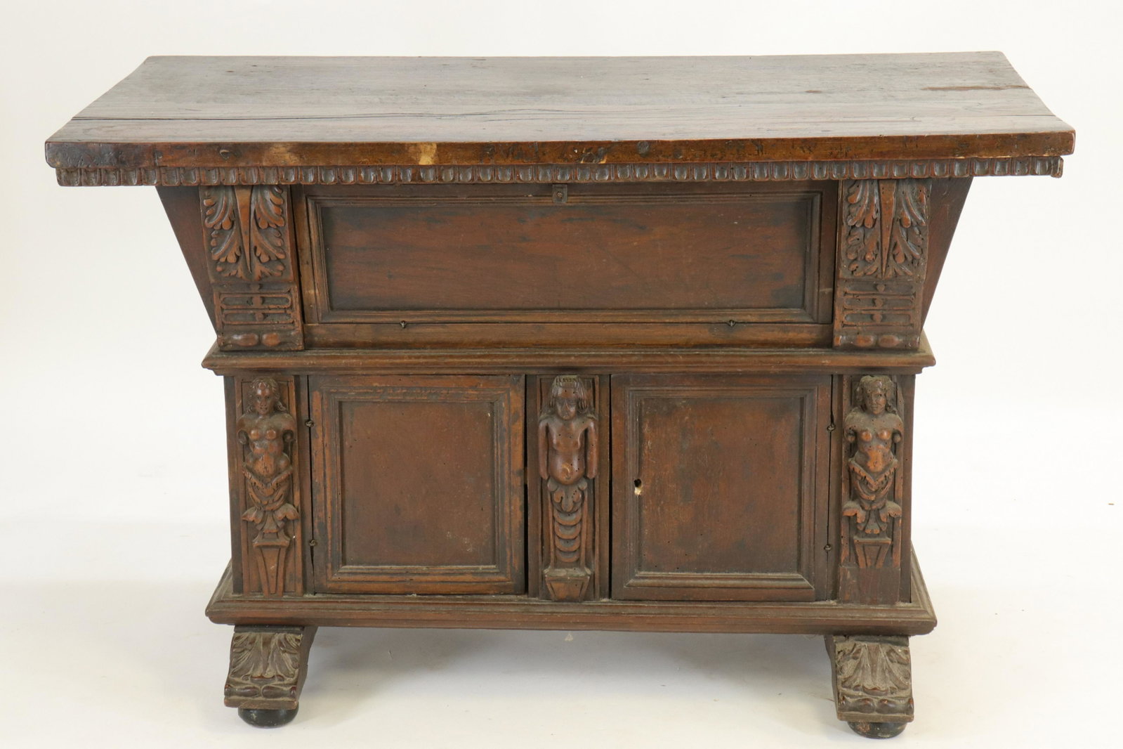 Italian Northern Baroque Library Table: Italian Northern Baroque Library Table, walnut with applied carved caryatid figures (RIJO2366)(WT) Dimensions: 32" H x 49" L x 26" D Property From the Estate of Richard I Johnson (1925-2020), Chestnut