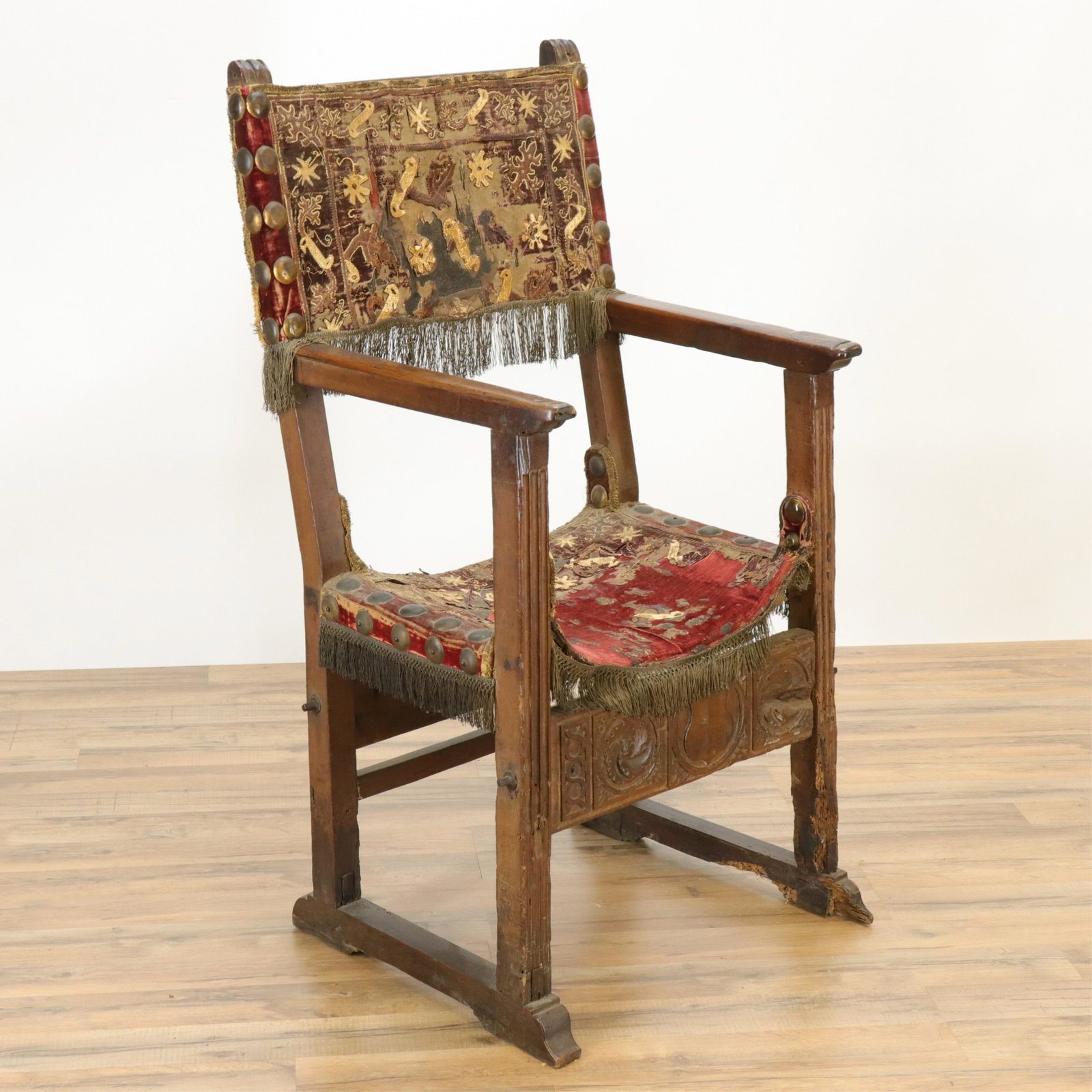 Spanish Baroque Arm Chair: Spanish Baroque Arm Chair, walnut, embossed velvet seat and back, round bosses, old label B. Altman (RIJO2484)(WT) Dimensions: 45 1/4" H x 21 1/4" W x 22 1/2" D Property From the Estate of Richard I J