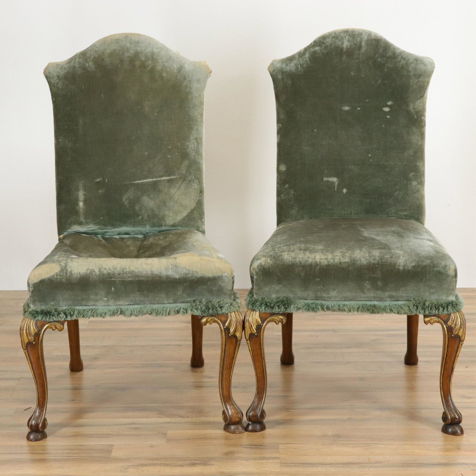 Pair English Rococo Style Side Chairs: Pair English Rococo Style Side Chairs, parcel gilt mahogany, green velvet upholstery (RIJO2669/2)(WT) Dimensions: 40 3/4" H x 22" W x 23" D Property From the Estate of Richard I Johnson (1925-2020), C