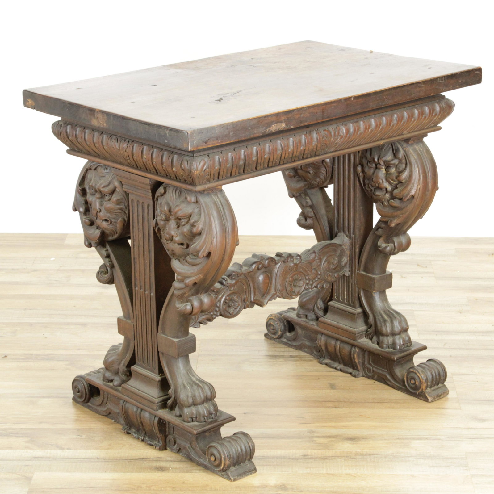Renaissance Revival Side Table, 19th C.: Renaissance Revival Side Table, 19th C., walnut with lyre supports carved with lion masks (RIJO2372)(WT) Dimensions: 26" H x 29" L x 19" D Property From the Estate of Richard I Johnson (1925-2020), Ch