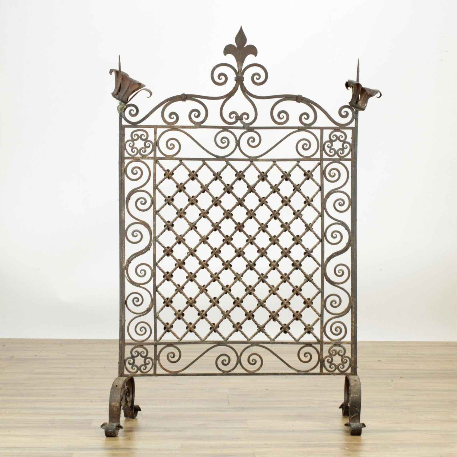 Italian Renaissance Revival Fire Screen/Pricket: Italian Renaissance Revival Wrought Iron Fire Screen with Pricket Sticks, 19th C. (RIJO874)(MS) Dimensions: 44 1/2" H x 30 12" W Property From the Estate of Richard I Johnson (1925-2020), Chestnut Hil