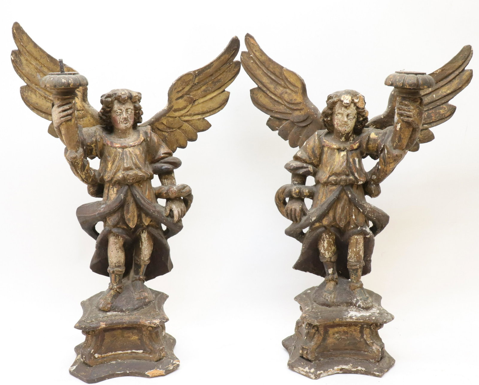 Pr Italian Baroque Pricket Candle Holders, 17/18 C: Pair Italian Baroque Pricket Candle Holders, 17th/18th C., angel figures in carved and polychromed giltwood (RIJO2661/2)(WT) Dimensions: 27" H x 18" W Property From the Estate of Richard I Johnson (19