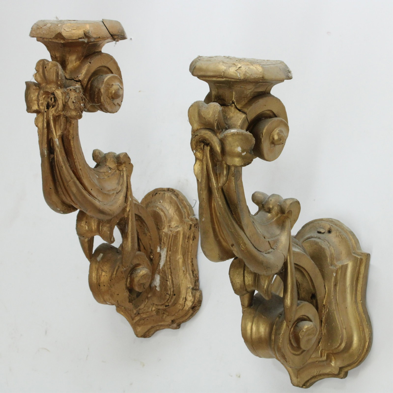 Pair Italian Baroque Pricket Sconces: Pair Italian Baroque Pricket Sconces, carved giltwood in scroll form (RIJO2330/2)(WT) Dimensions: 20" H x 12" D Property From the Estate of Richard I Johnson (1925-2020), Chestnut Hill, Massachusetts.