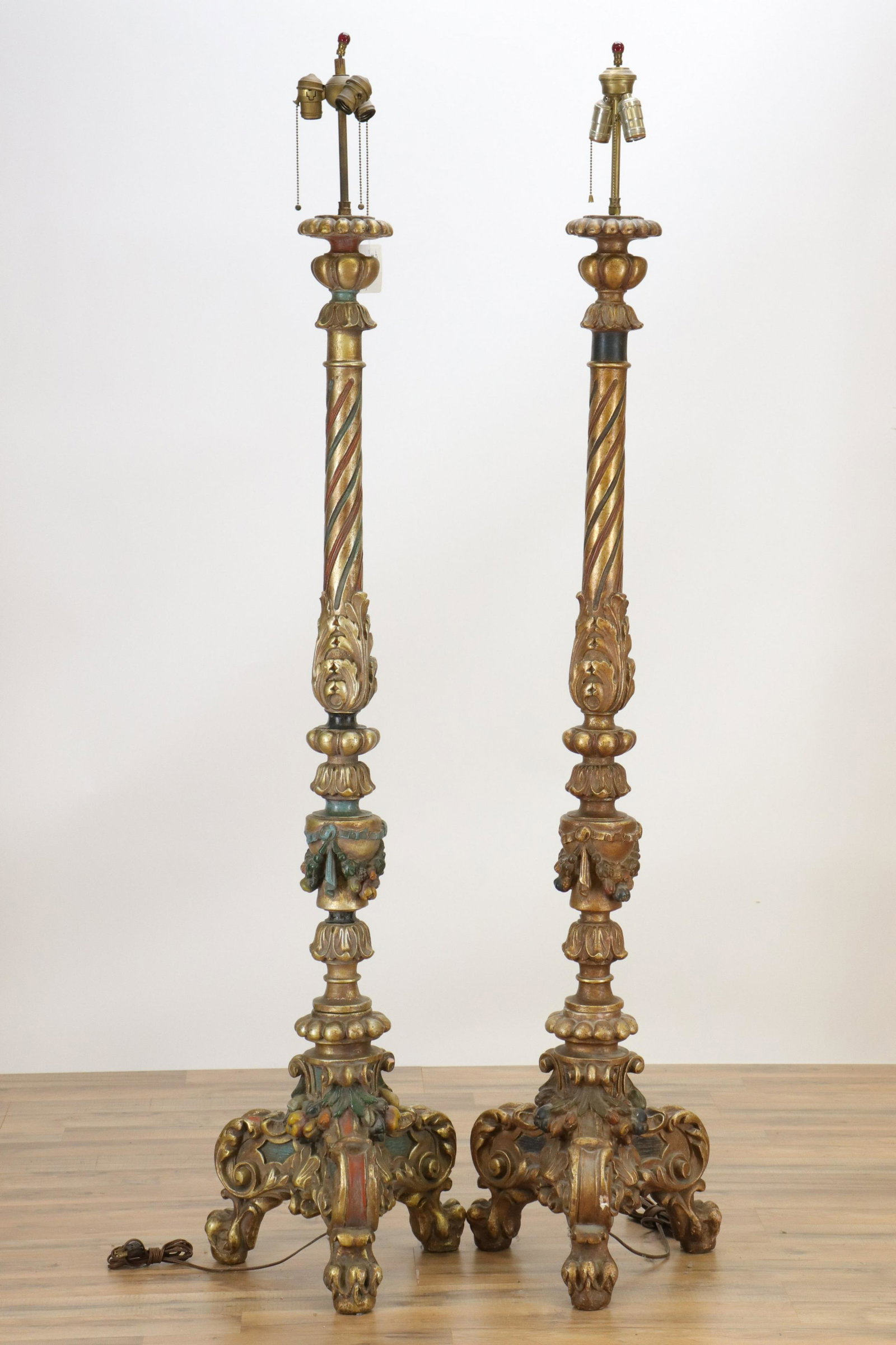 Pr Venetian Style Renaissance Revival Floor Lamps: Pair Venetian Style Renaissance Revival Floor Lamps, Early 20th C., polychromed and parcel gilt composition (RIJO2678/2)(WT) Dimensions: 73" H x 16" Dia. Property From the Estate of Richard I Johnson 