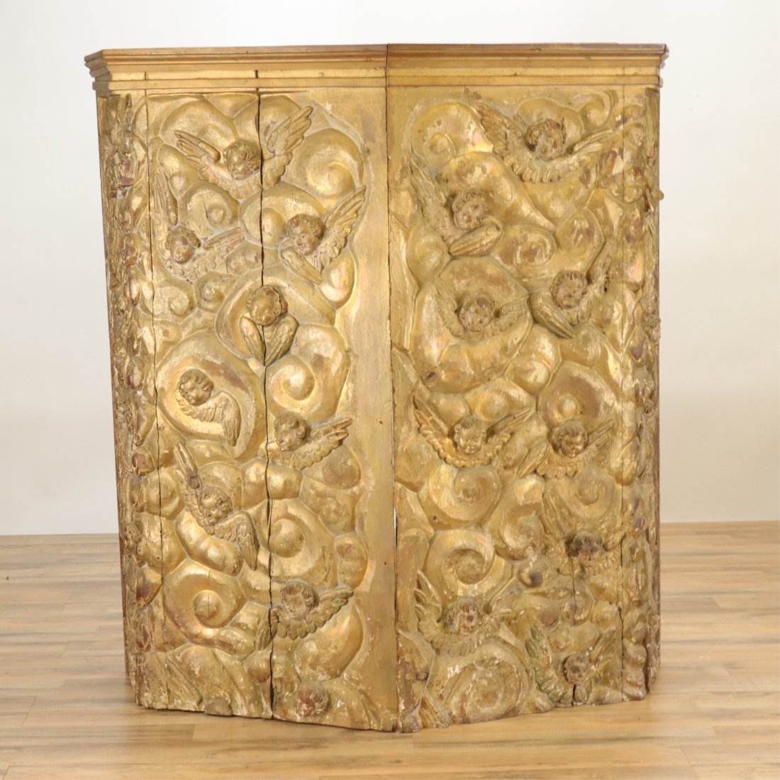 Italian Baroque Architectural Elements, 18th C.: Italian Baroque Architectural Elements, 18th C., panels in half octagonal form, carved and gilded with putti and angels, now with walnut top for use as a bar (RIJO2376/3)(WT) Dimensions: 53" H x 49" W