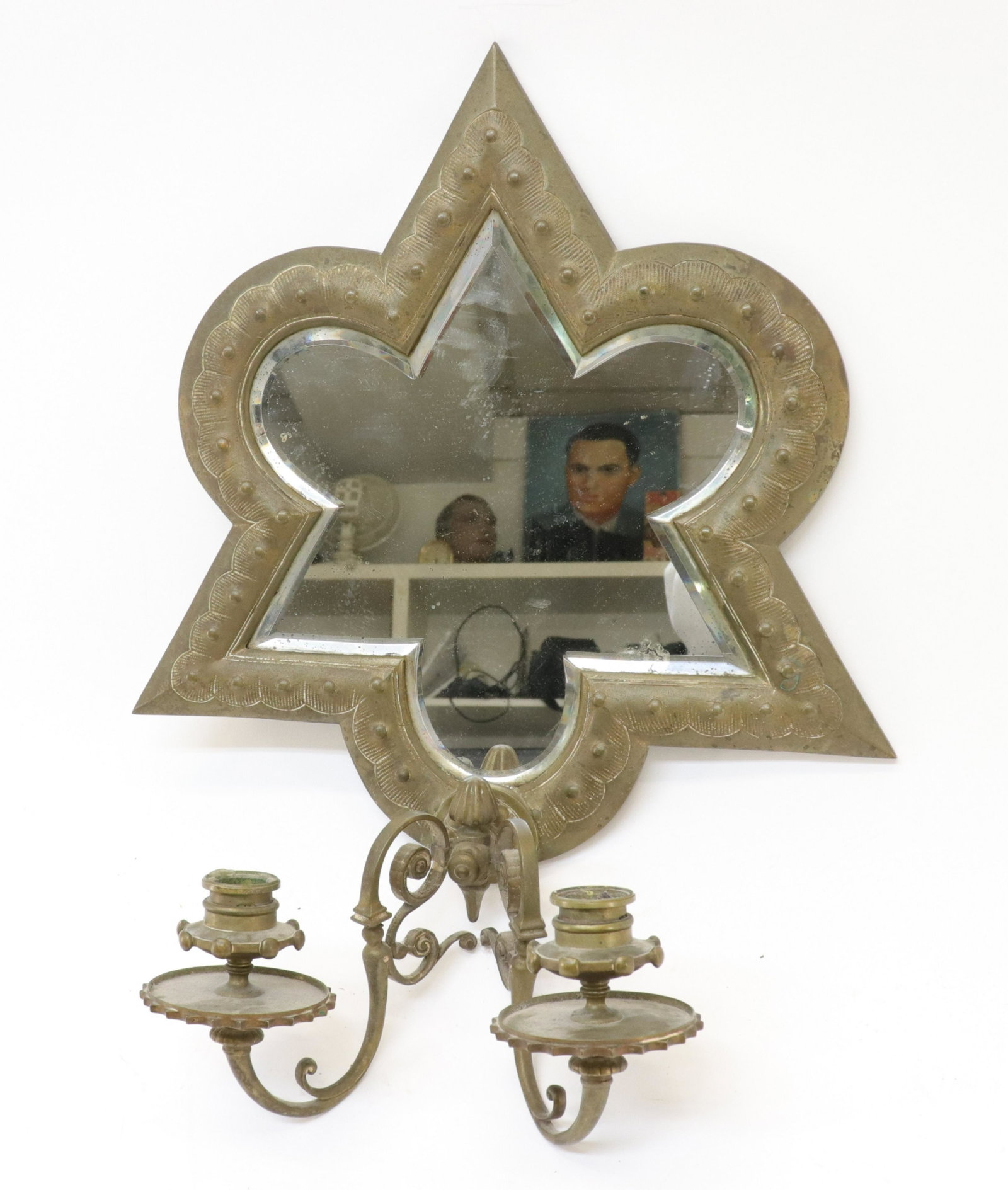 Tiffany & Co. Makers Repousse Mirrored Sconce: TIFFANY & CO MAKERS brass sconce with mirror, verso stamped Tiffany & Co 253 MAKERS 6005 M (JOHN654)(MS) Dimensions: 18" H x 14" W Property from a South Kent, CT collection