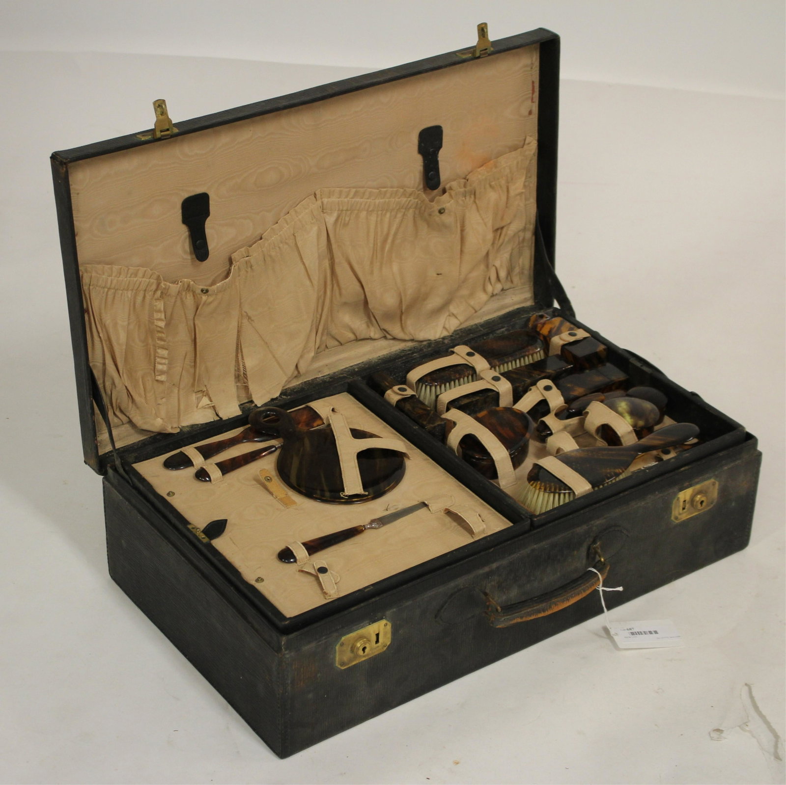 Edwardian Leather Bound Suitcase & Dressing Kit: Mens faux tortise shell dressing kit initialed EM (PTIL687)(MS) Dimensions: 15 H x 24 W x 6.5 D