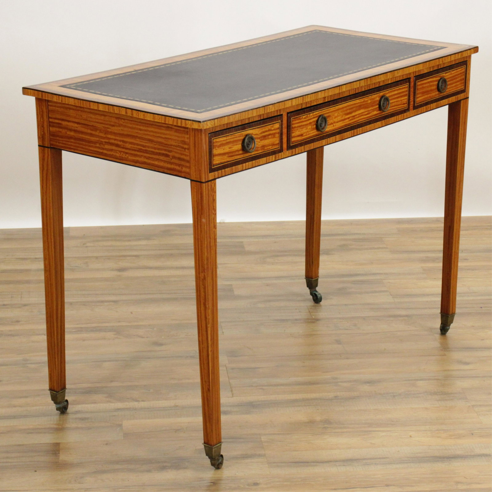 Edwardian Inlaid Stainwood Desk, Early 20th C.: Edwardian Inlaid Stainwood Desk, Early 20th C. (BECK491)(MS) Dimensions: 29 3/4" H x 40 1/4" W x 19 3/4" D Property from a Park Avenue Estate