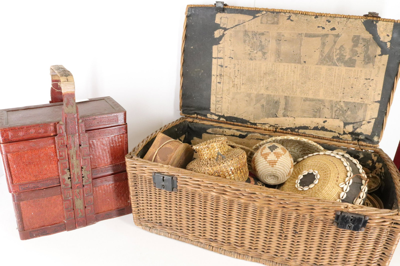 Collection of Baskets: Collection of Baskets, includes red Chinese, Zulu, other African, picnic and others Dimensions: Largest 12" H x 28" L x 15" W, smallest 3" H x 2 1/2" dia. (VIRO024/17)(WT)