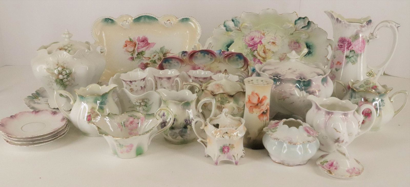 22 Various Pieces - Floral, R.S. Prussia: 22 Various Pieces, R.S. Prussia porcelain, 4 cups and not marked, all floral patterns Dimensions: Coffee pot 9 1/2" H, Largest oval dish 13" L (BECK030/22)(WT)