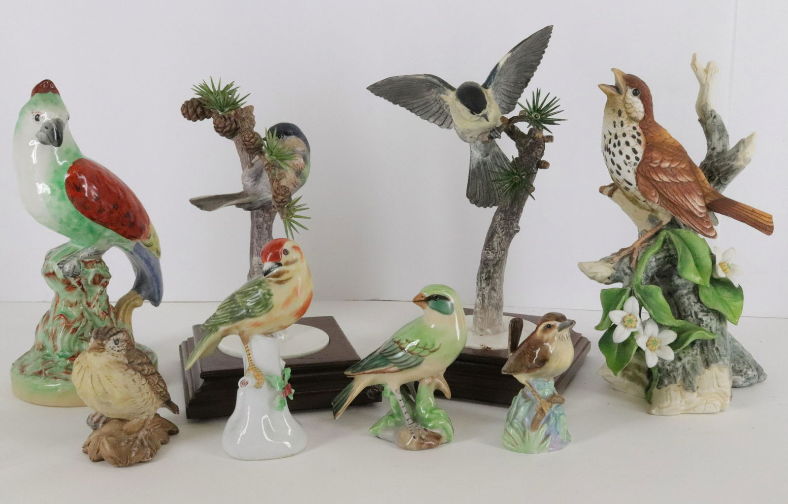 7 Ceramic Birds; Staffordshire Parrot: 7 Ceramic Birds, includes Staffordshire ParrotDimensions: 3 1/2" H to 9 1/2" H, Tallest on stand 10 1/2" (BECK050/7)(WT)