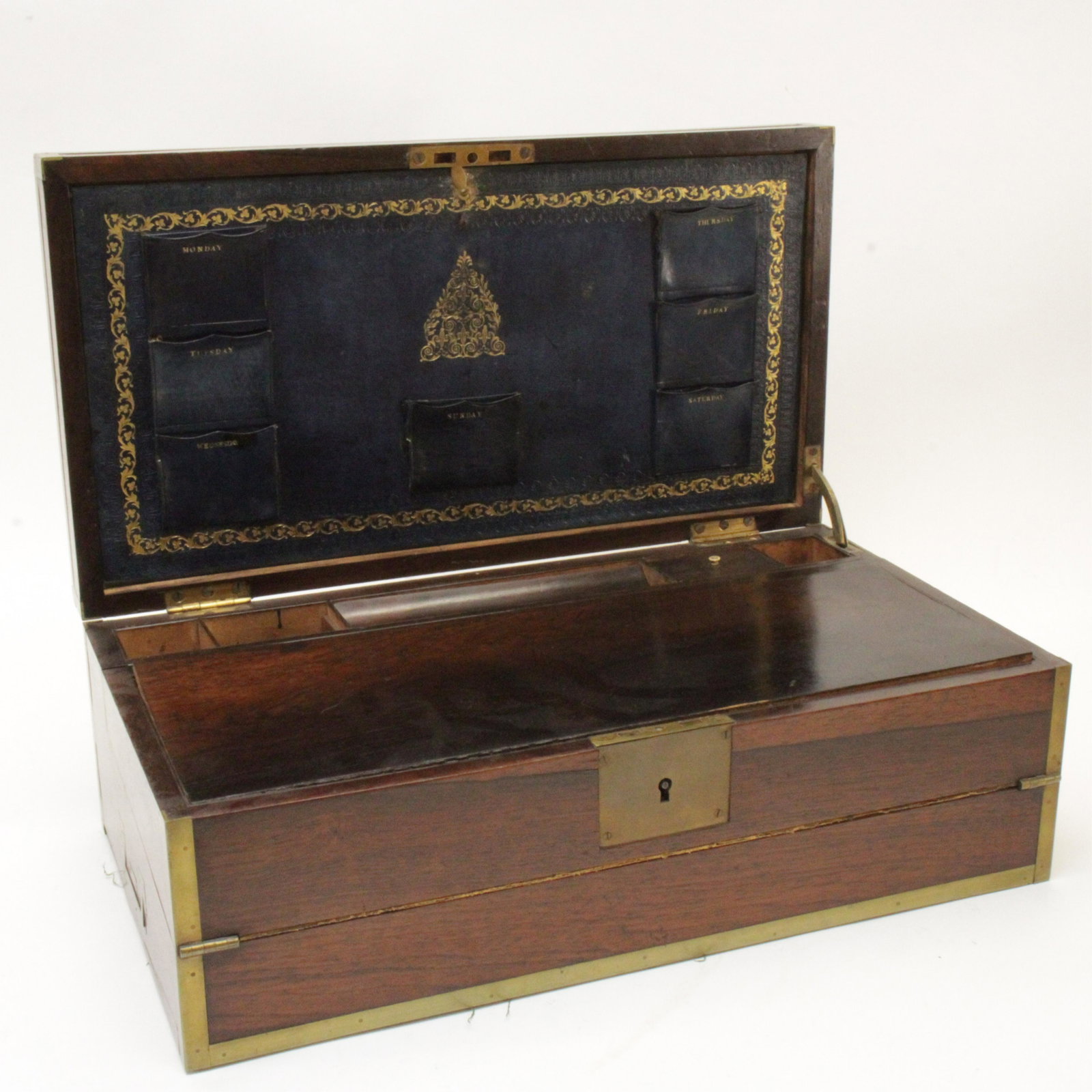 Victorian Brass Bound Rosewood Lap Desk, 19 C.: Victorian Brass Bound Rosewood Lap Desk, 19th C., incised Rev'd W.J. Mellish Dimensions: 7" H x 20" W x 10 3/4" D Property from a private Alpine, New Jersey collection (MLEN464)(MS)