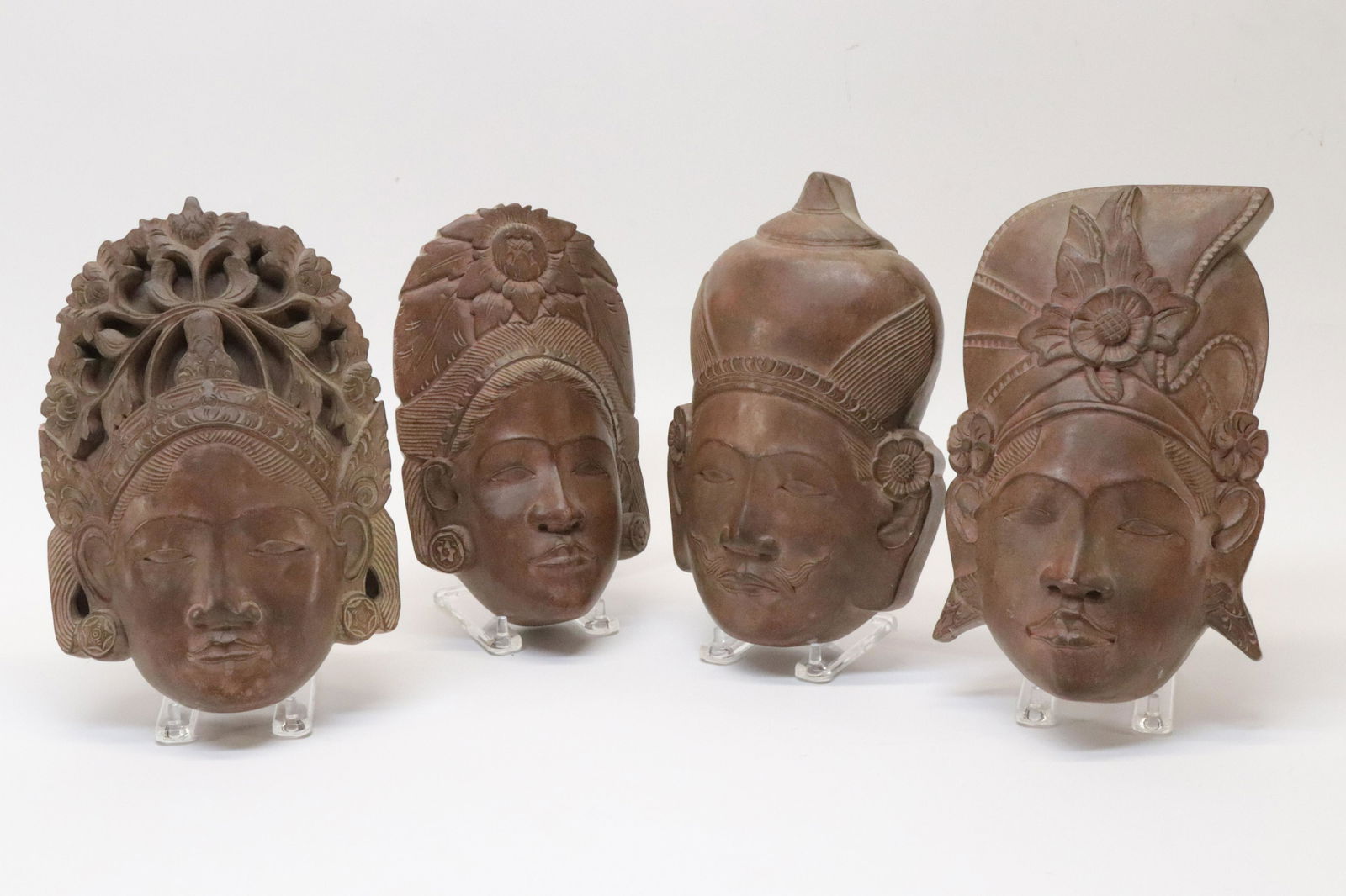 Four Cambodian Cast and Carved Heads (1 of 4)