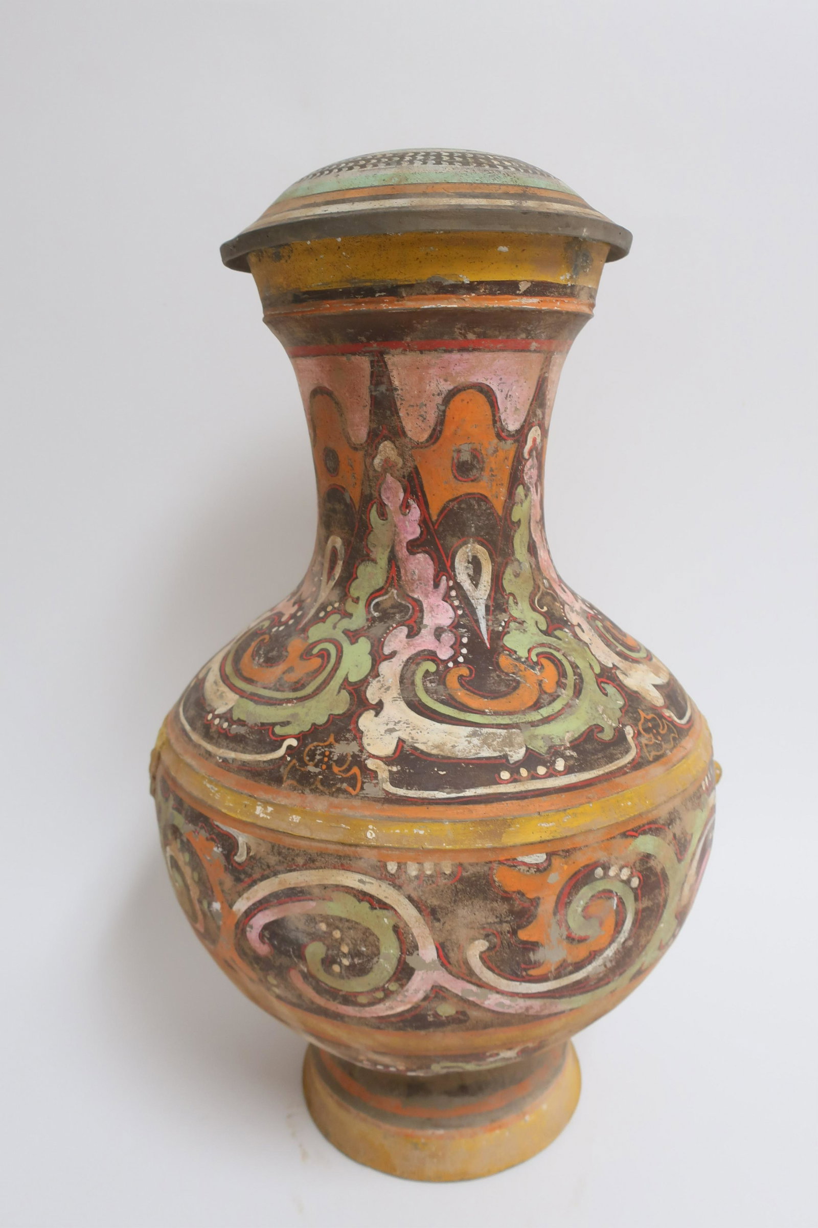 Large Chinese Han Terracotta Hu: Very large Hu shape vessel with intact lid in the style seen in the Western Han dynasty (206 BCE - 9 CE). Very well formed and painted overall in the style of the period with red, black, ochre, green,