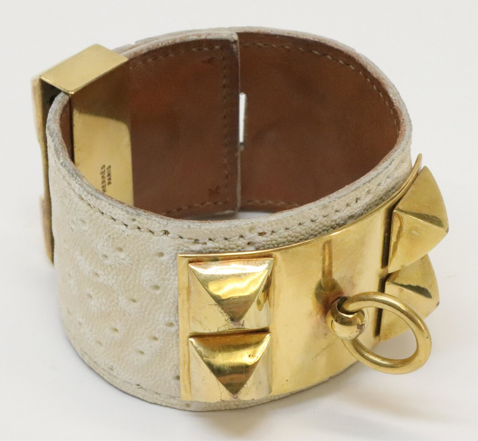 Vintage Hermes Whale Collier de Chien Bracelet: A Vintage Hermes Whale Skin Collier de Chien Bracelet with gold tone hardware. Foiled stamped Hermes Paris in center, end stamped K A. Circa 1960s. Possibly for Bonwit Teller. 4 cm wide, about 20 cm l